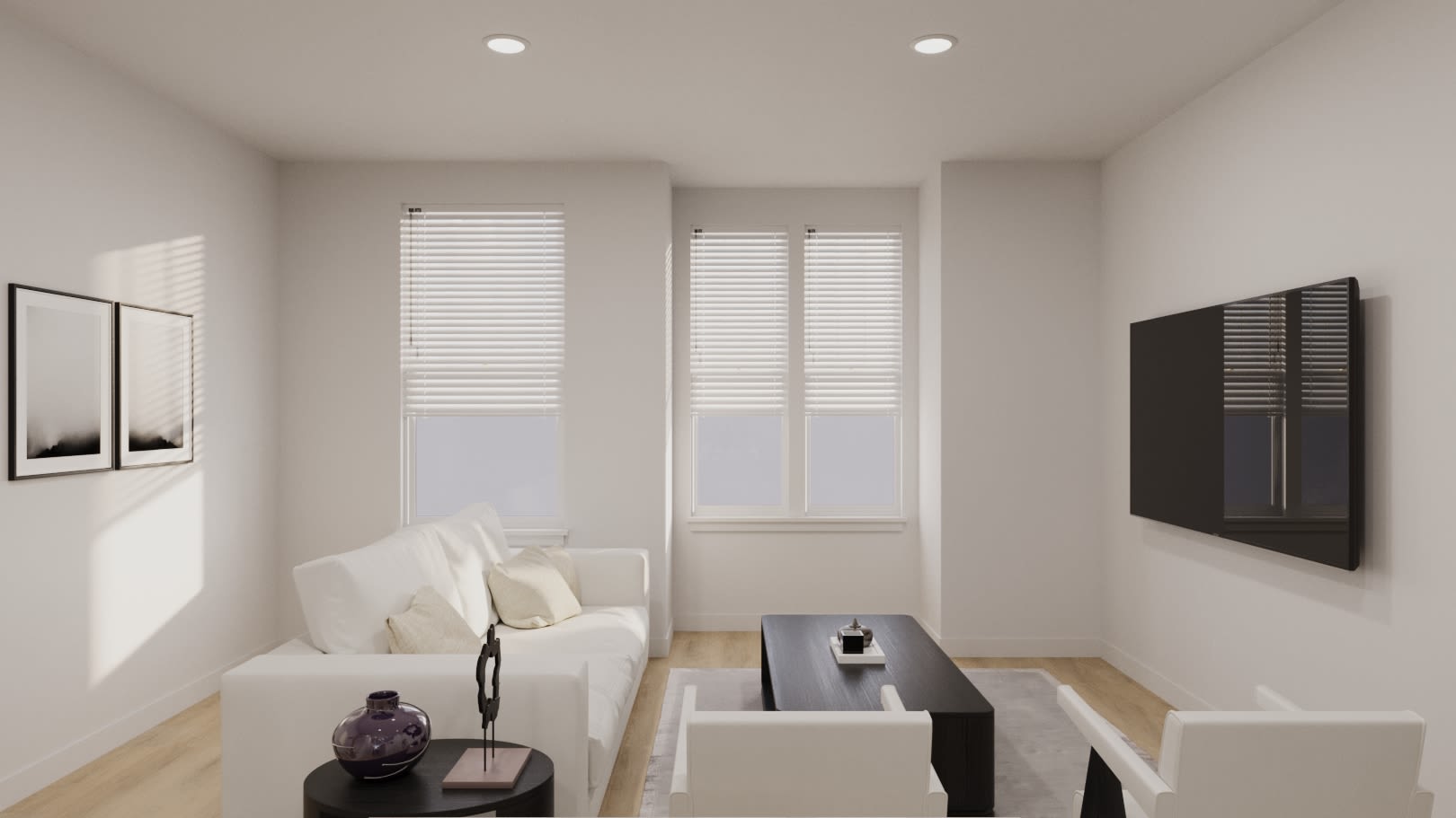 Living room with couch and windows at Maybrook Terraces in Greenville, South Carolina