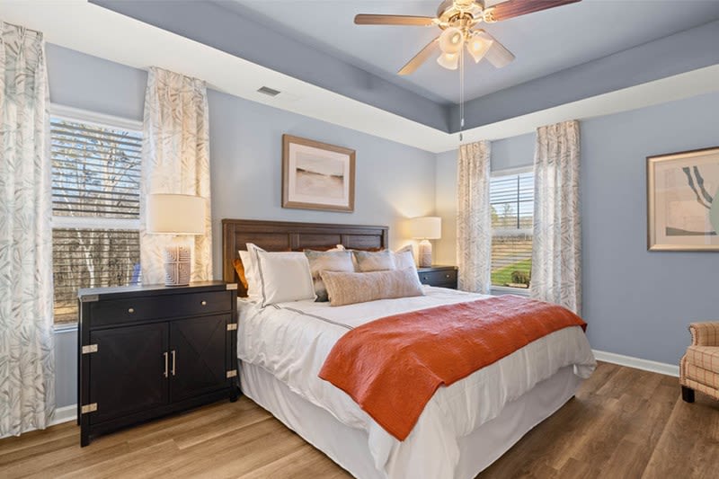 Vibrant bedroom at The Lakes at Statham in Statham, Georgia