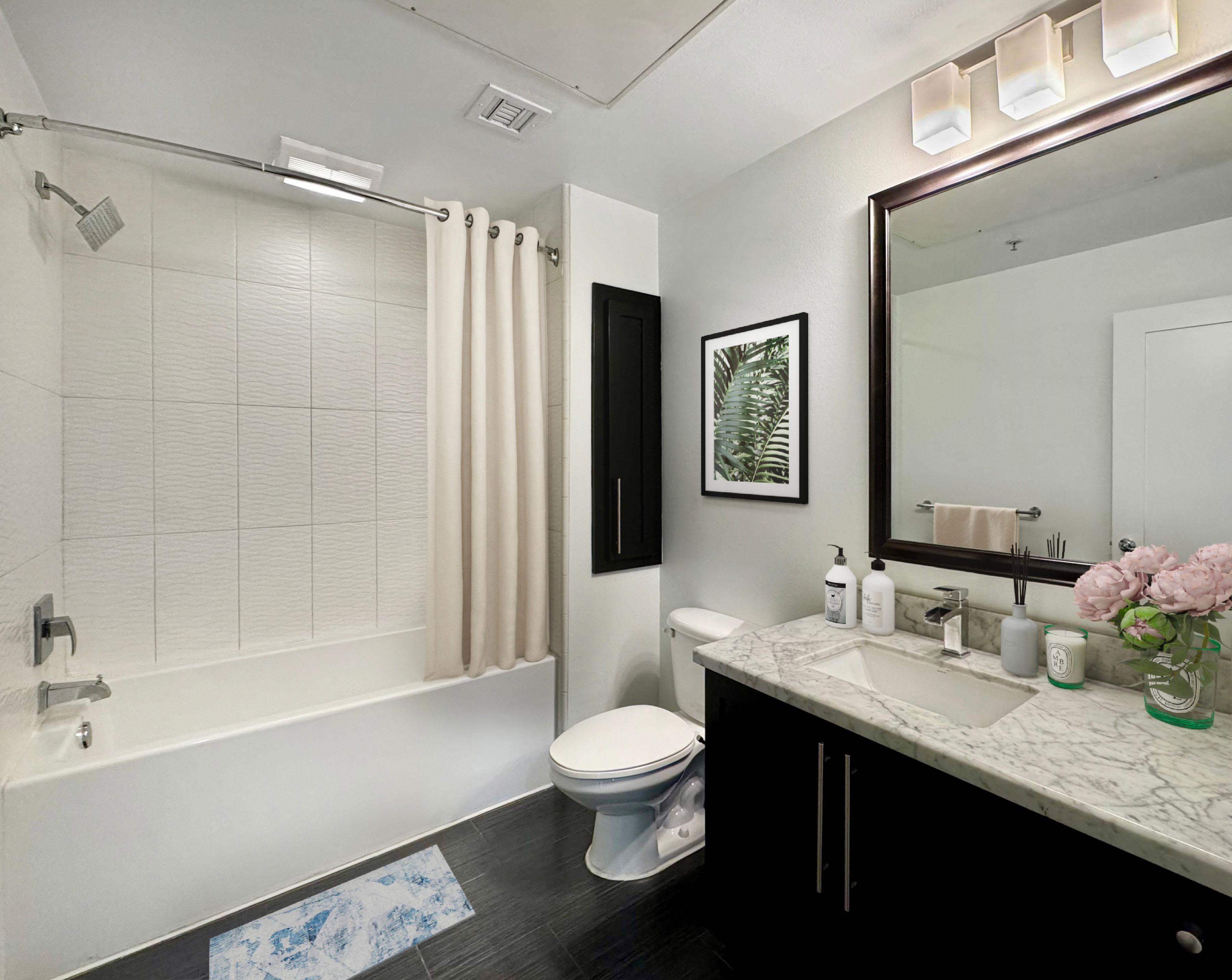 Spacious bathroom with quartz countertops at La Belle at Hollywood Tower in Los Angeles, California