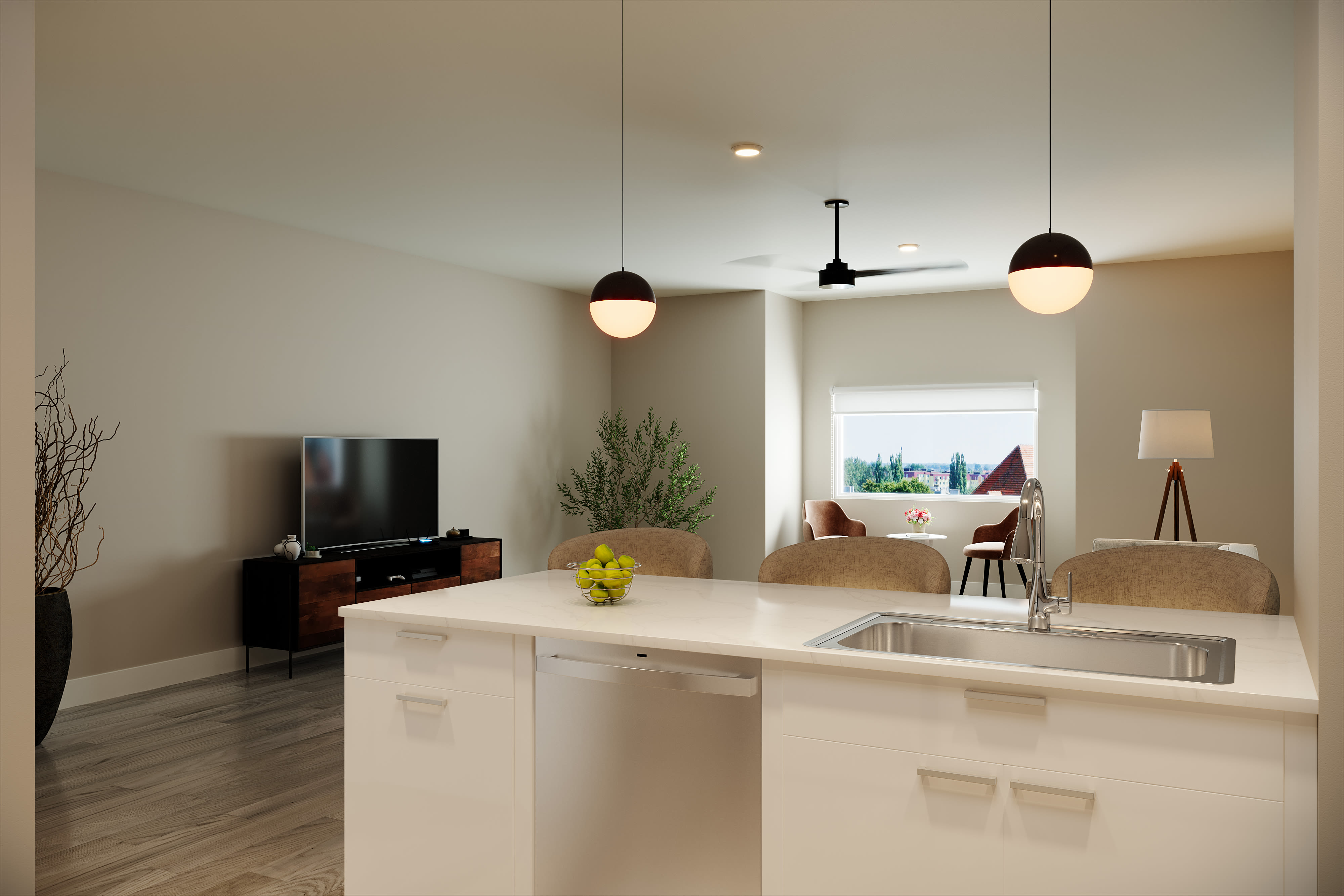 View of the living room from kitchen at Stone Village Apartments in Reno, Nevada