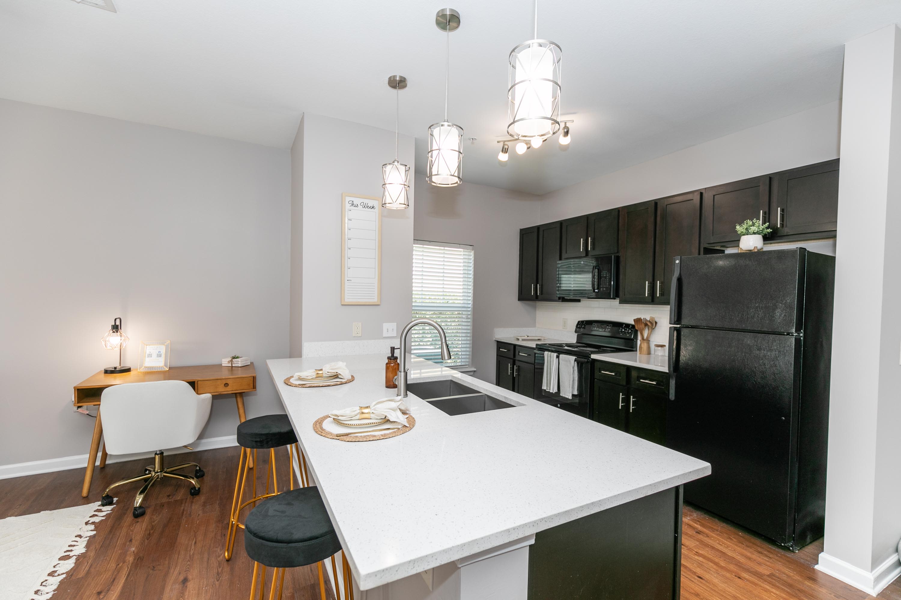 Kitchen with appliances at Thomaston Crossing in Macon, Georgia