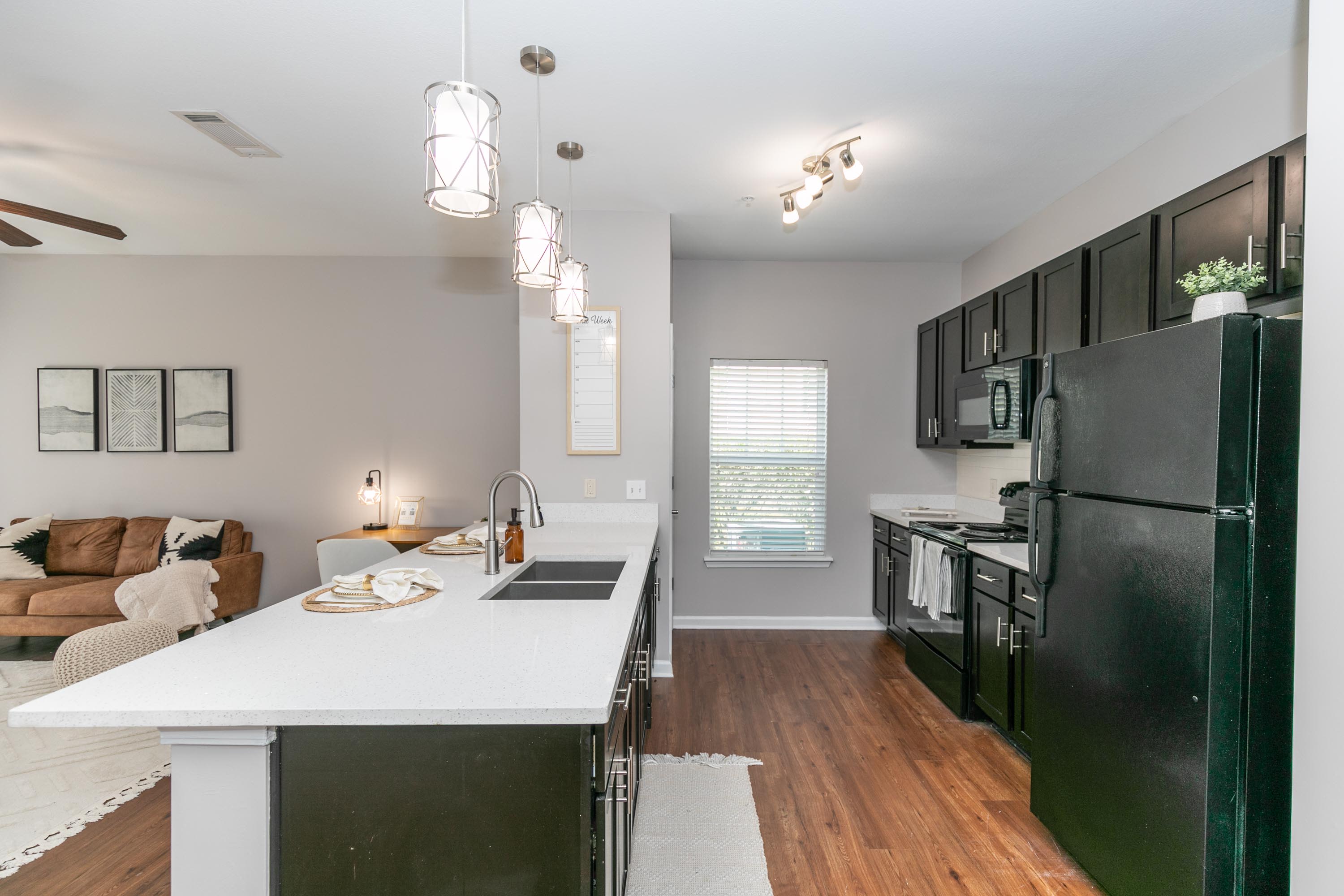 Kitchen with appliances at Thomaston Crossing in Macon, Georgia