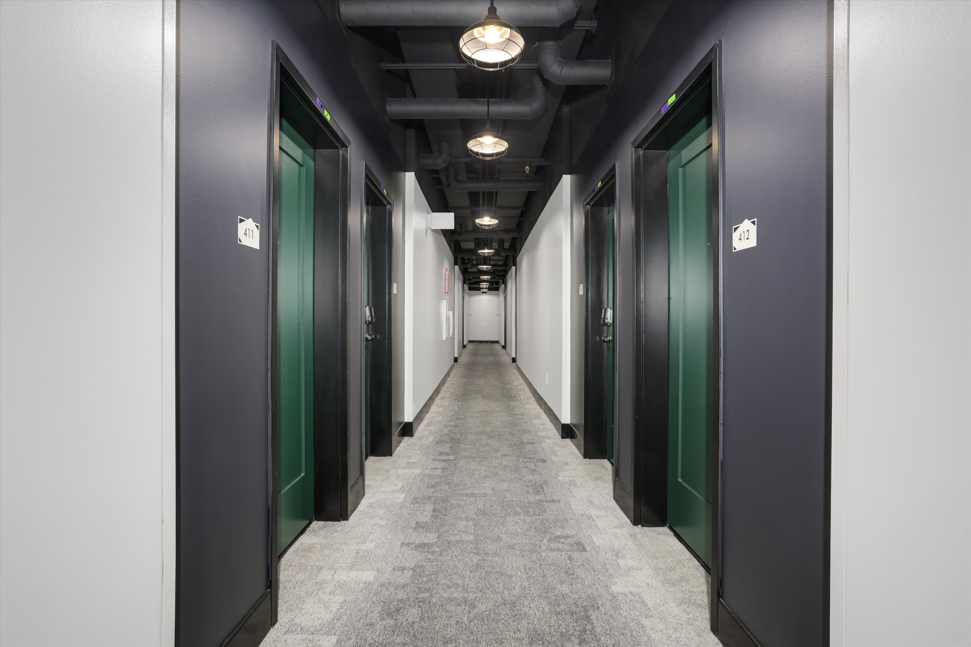Hallway to apartment at Piquette Flats in Detroit, Michigan