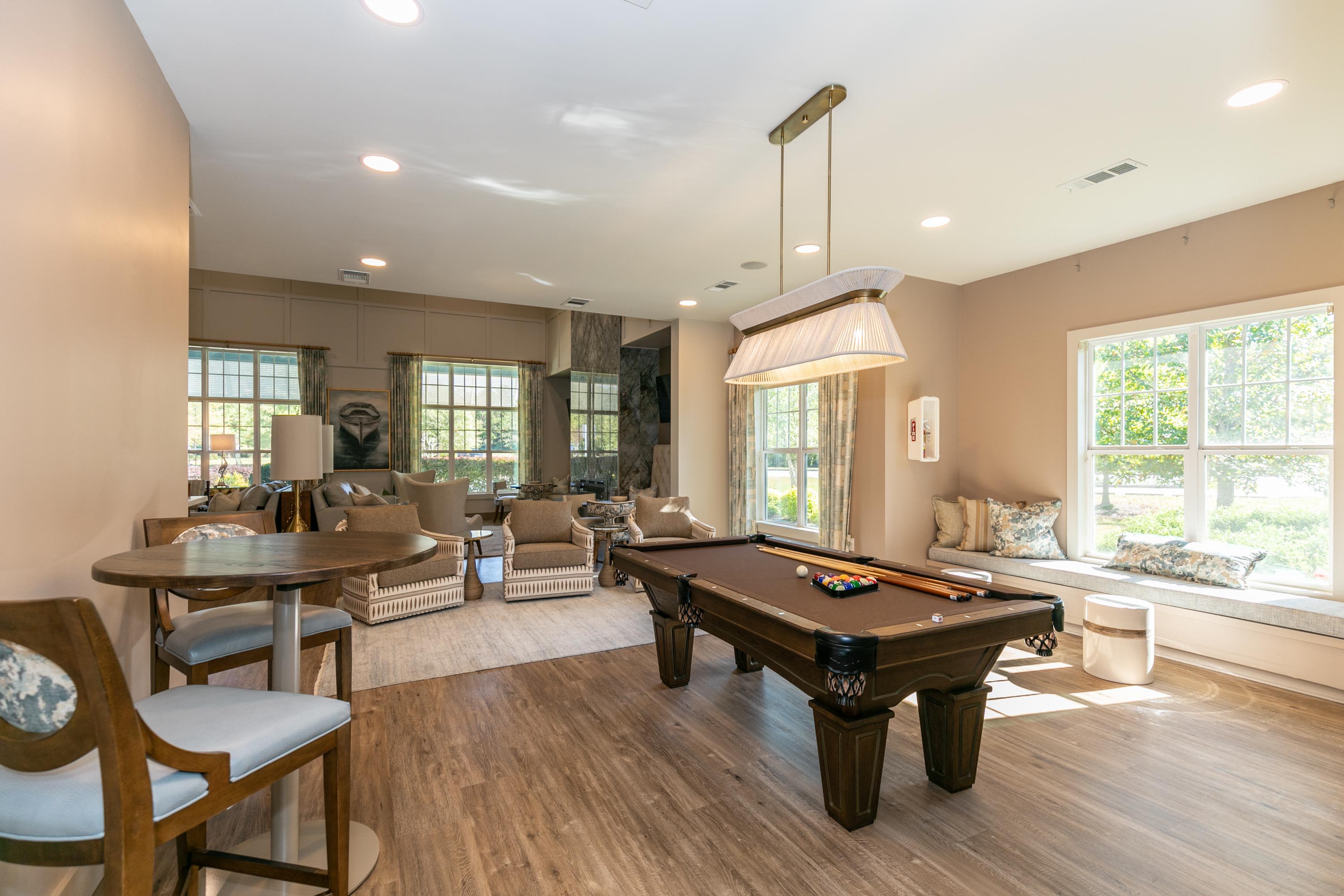 Game room with a billiard table at Thomaston Crossing in Macon, Georgia