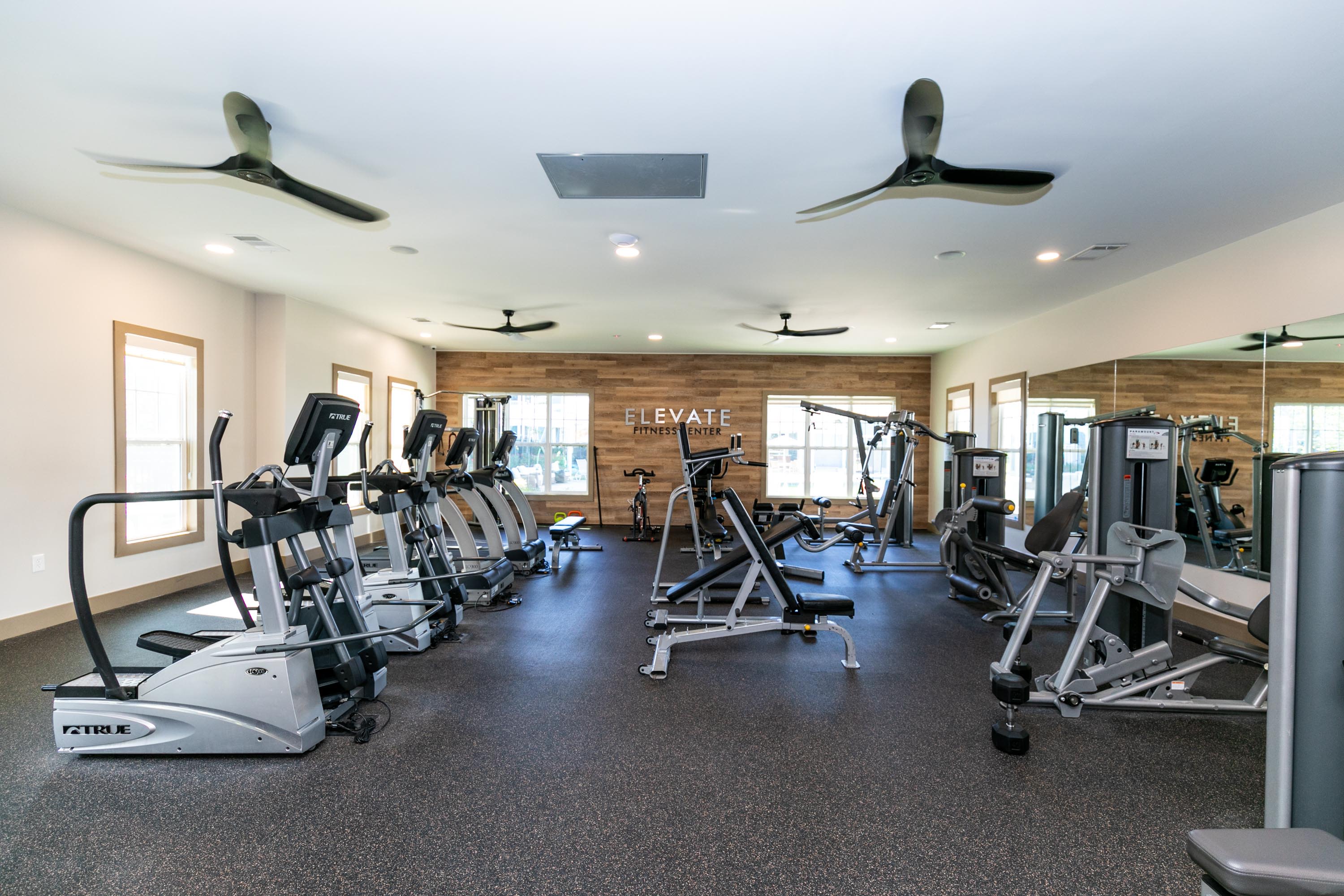 A gym room with exercise machines at Thomaston Crossing in Macon, Georgia