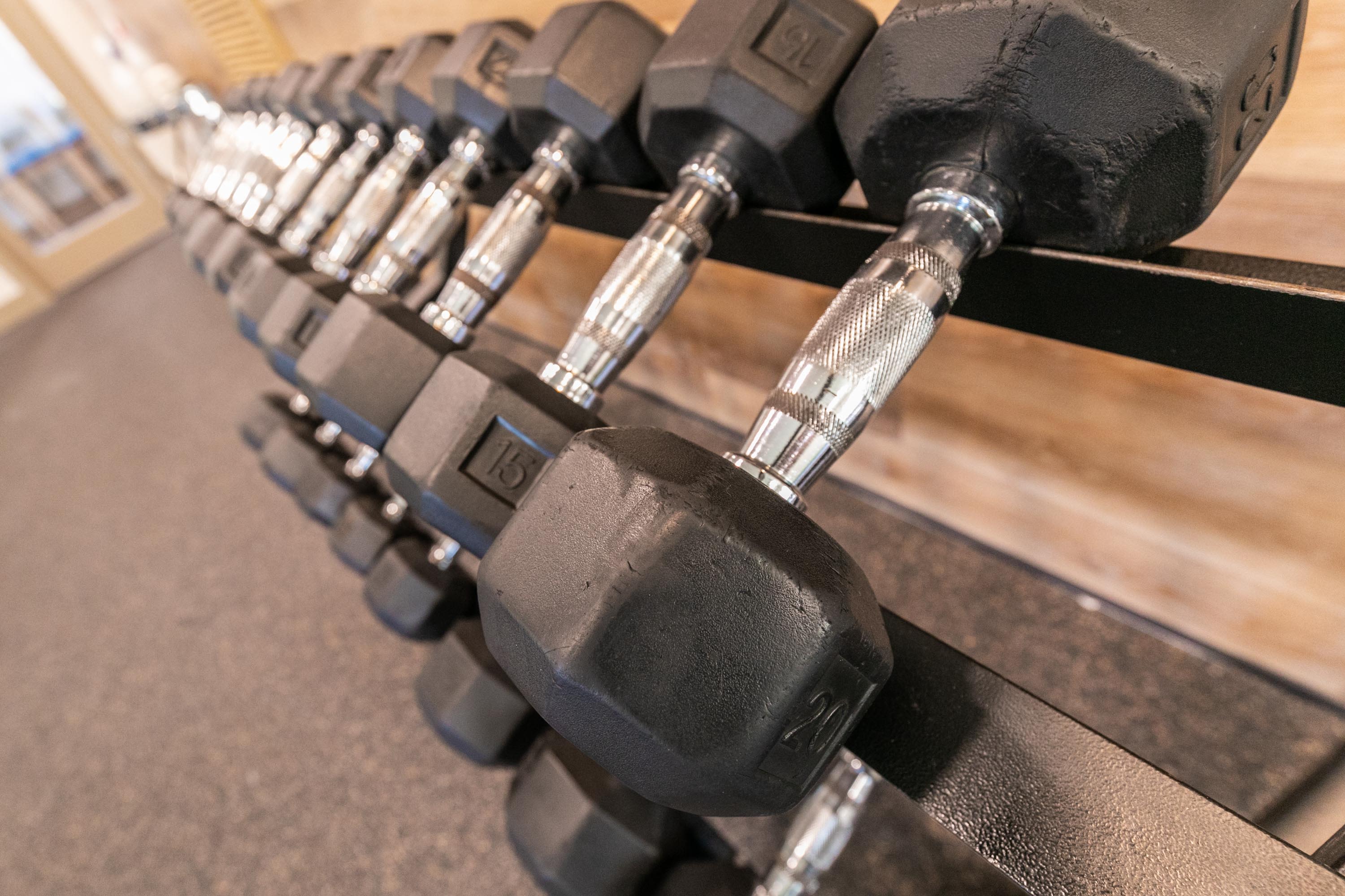 A photo of dumbbells in a gym at Thomaston Crossing in Macon, Georgia