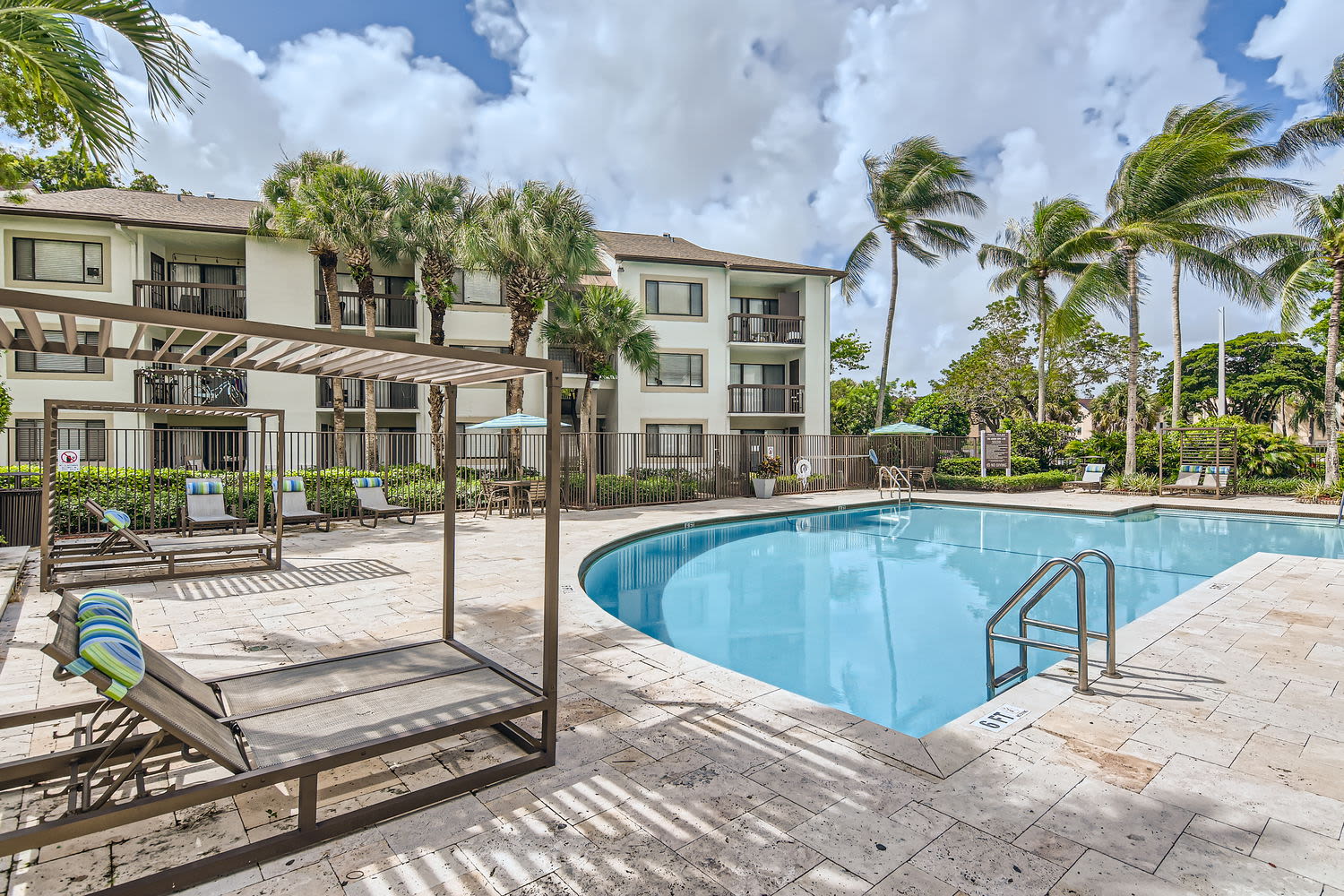 Resort-style swimming pool at Cascades at the Hammocks in Miami, Florida