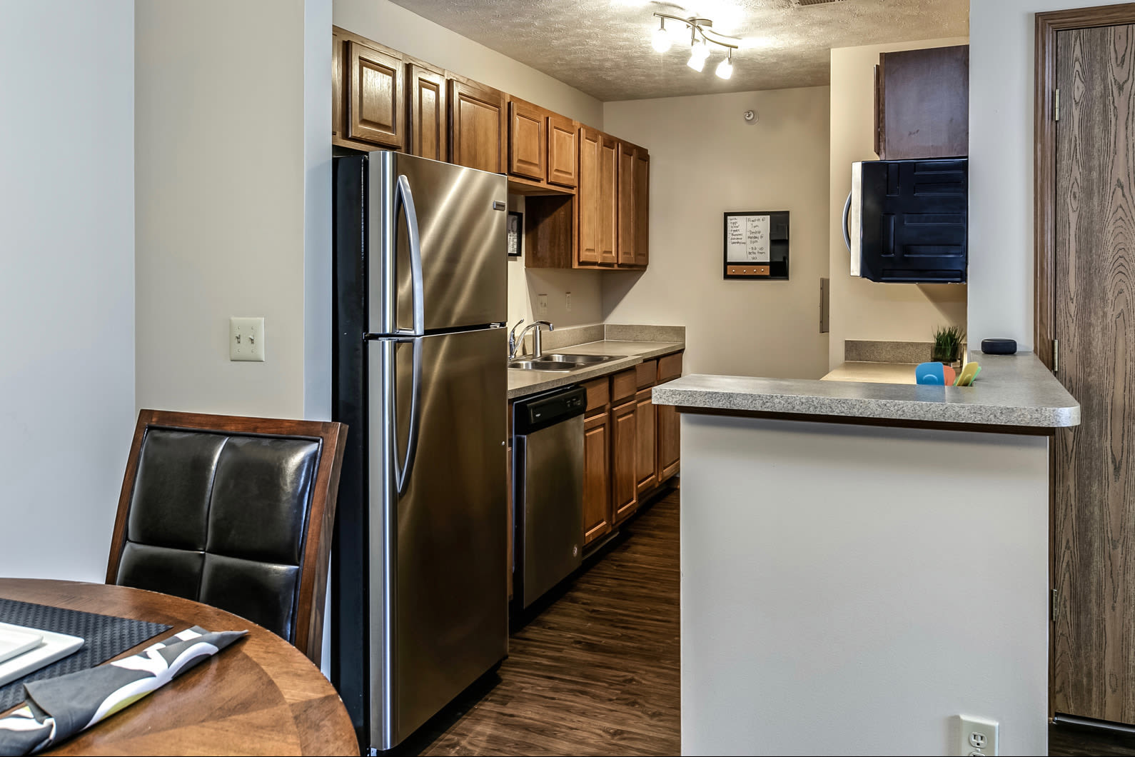 Kitchen with new appliances at The Falgrove Apartments in Omaha, Nebraska