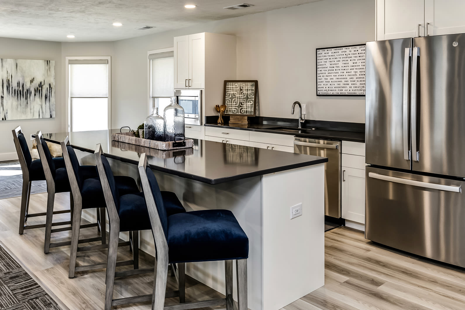 Clubhouse kitchen with island at The Falgrove Apartments in Omaha, Nebraska