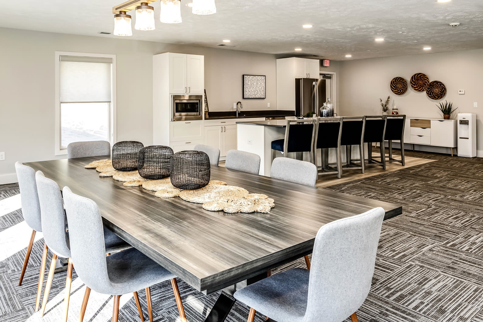 Clubhouse kitchen and dining area at The Falgrove Apartments in Omaha, Nebraska