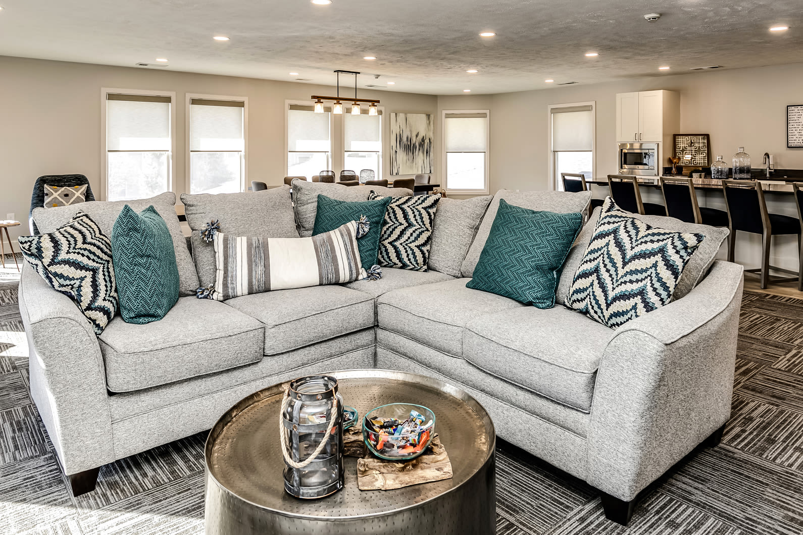 Resident lounge area with plush sofa at The Falgrove Apartments in Omaha, Nebraska