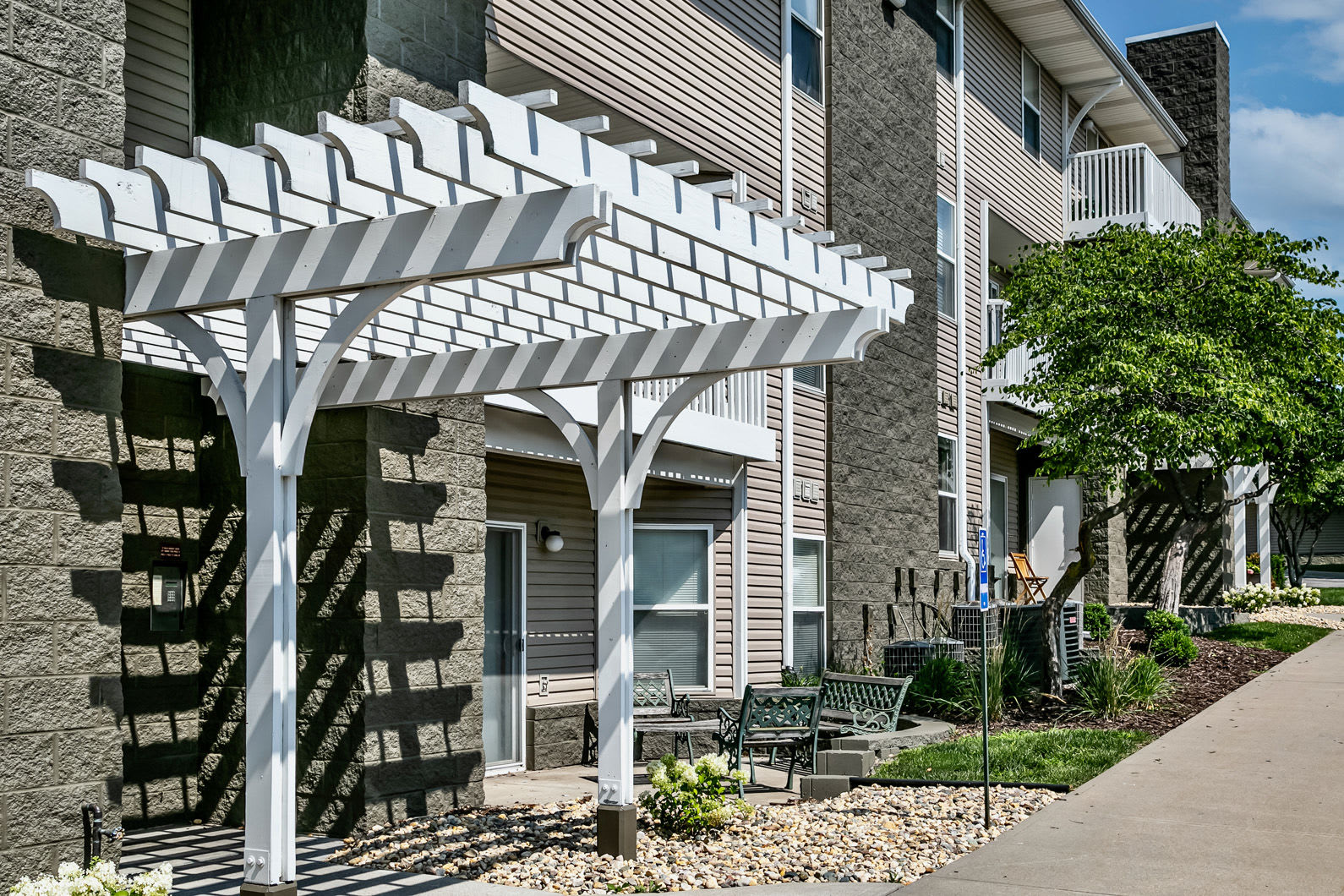 Apartments with outdoor patio at The Falgrove Apartments in Omaha, Nebraska