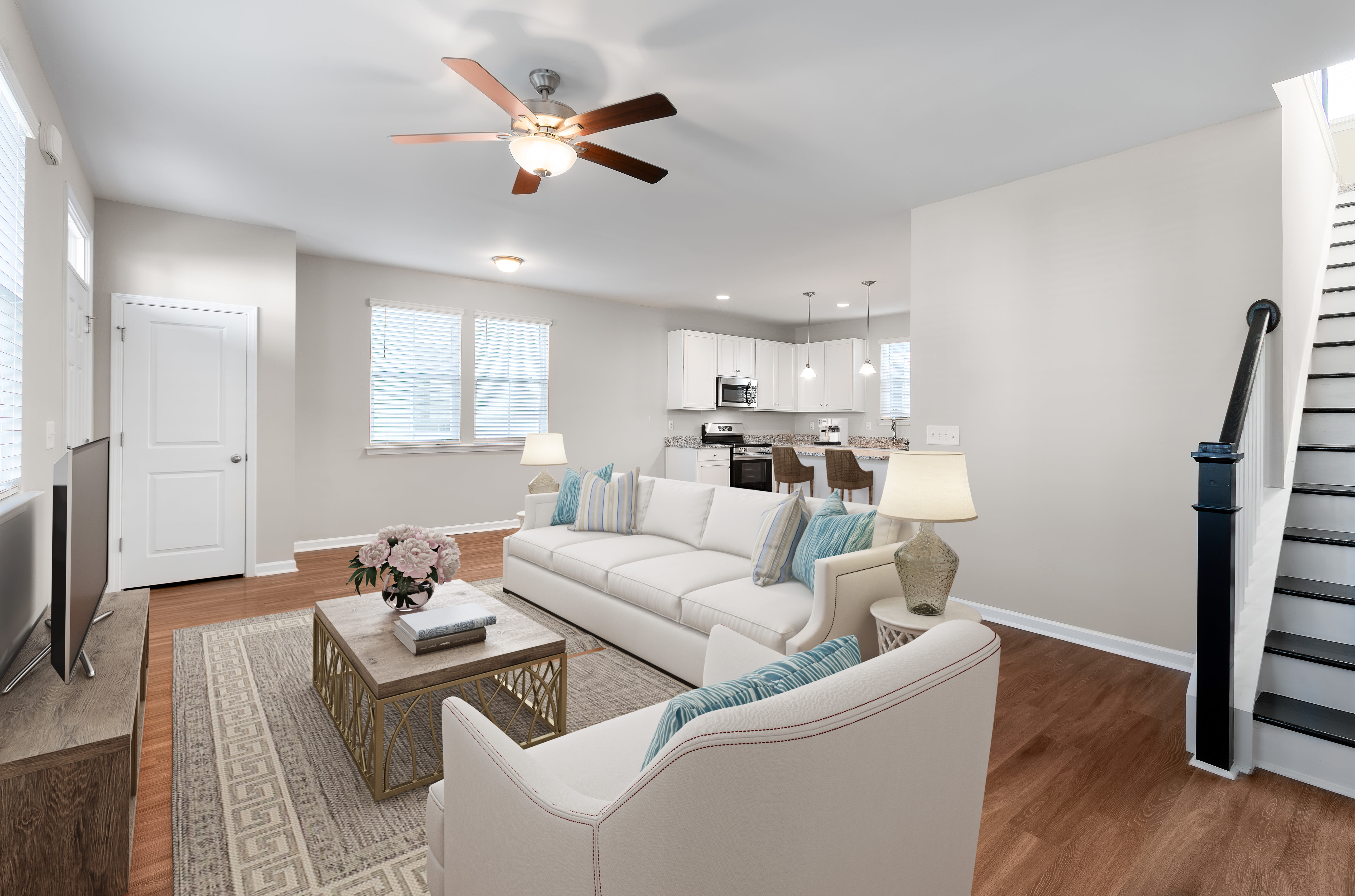 Modern living room with wooden flooring at Argent Cottages in Hardeeville, South Carolina