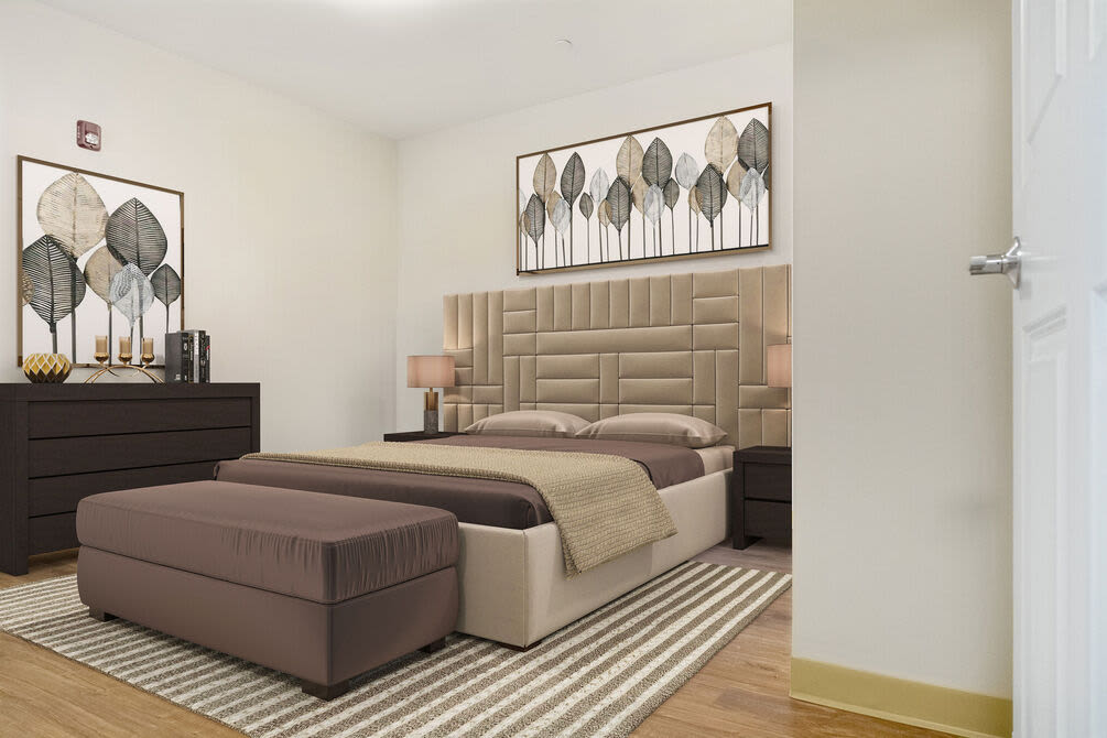 Bedroom with king-sized bed at 254 Broadway in Methuen, Massachusetts