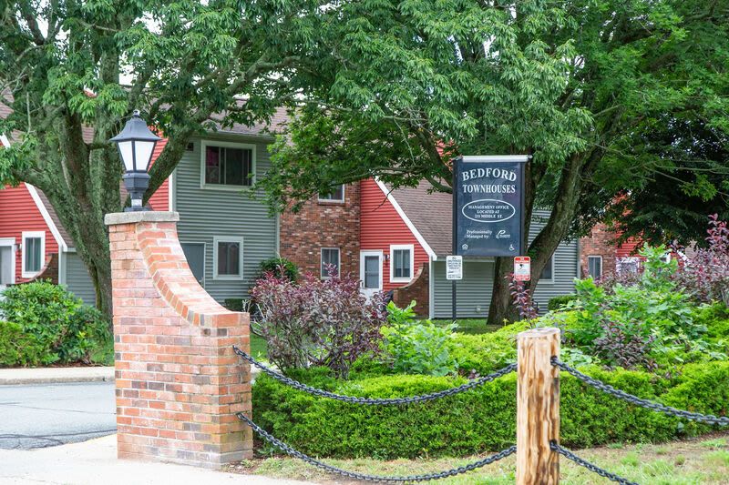 Exterior view of the apartments with signage at Bedford Towers in New Bedford, Massachusetts