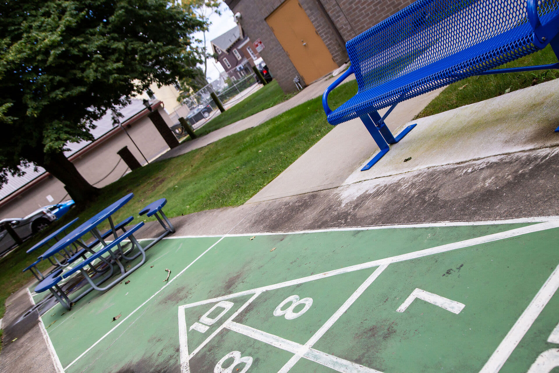 Seating area beside the basketball court at Bedford Towers in New Bedford, Massachusetts