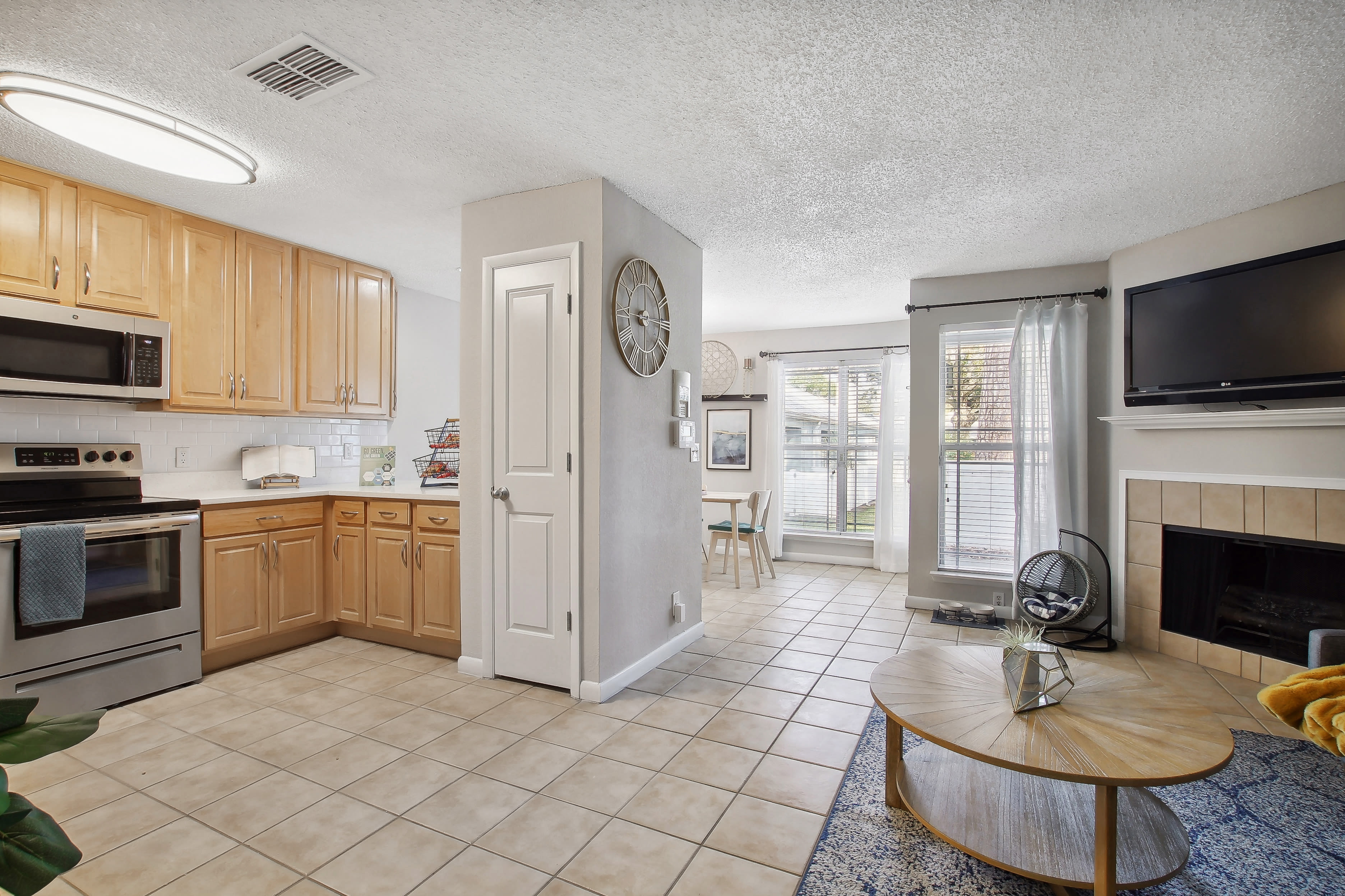 Kitchen with amenities at The Canopy Apartment Villas in Orlando, Florida