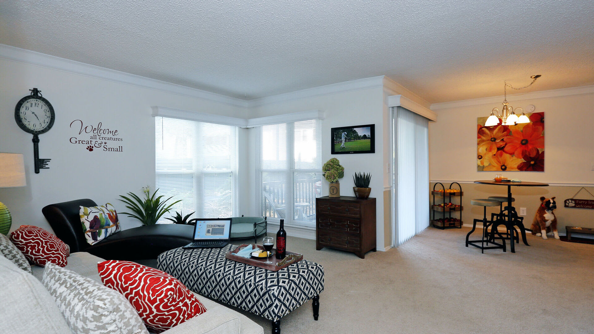 Living room with connecting dining space at Thickett in Mt Pleasant, South Carolina