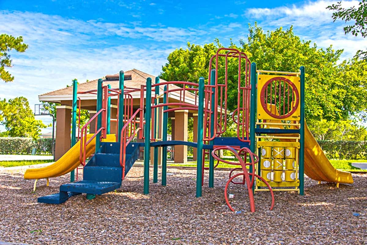 Playground with slides for kids at Redland Arms Apartments in Florida City, Florida