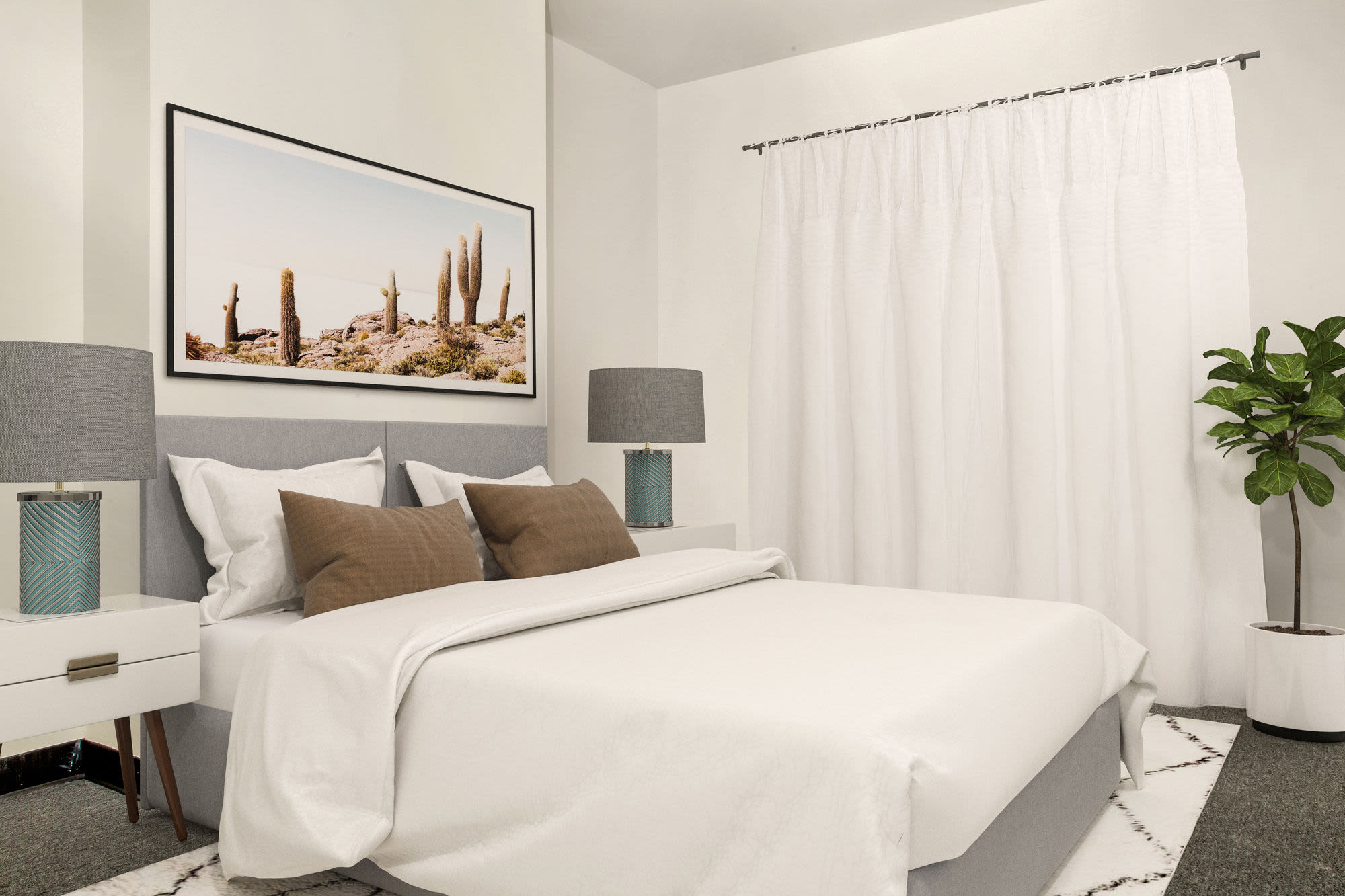 Bedroom with carpet flooring at Commerce Apartments in Roxbury, Massachusetts