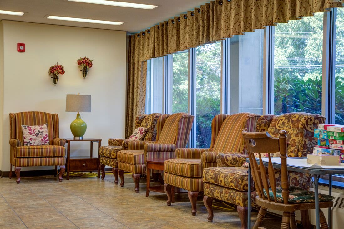 Clubhouse with large window at Congregational Retirement Homes in Melrose, Massachusetts
