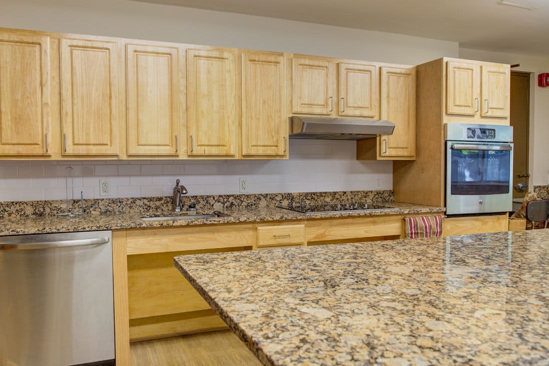 Kitchen with granite counter tops at Congregational Retirement Homes in Melrose, Massachusetts