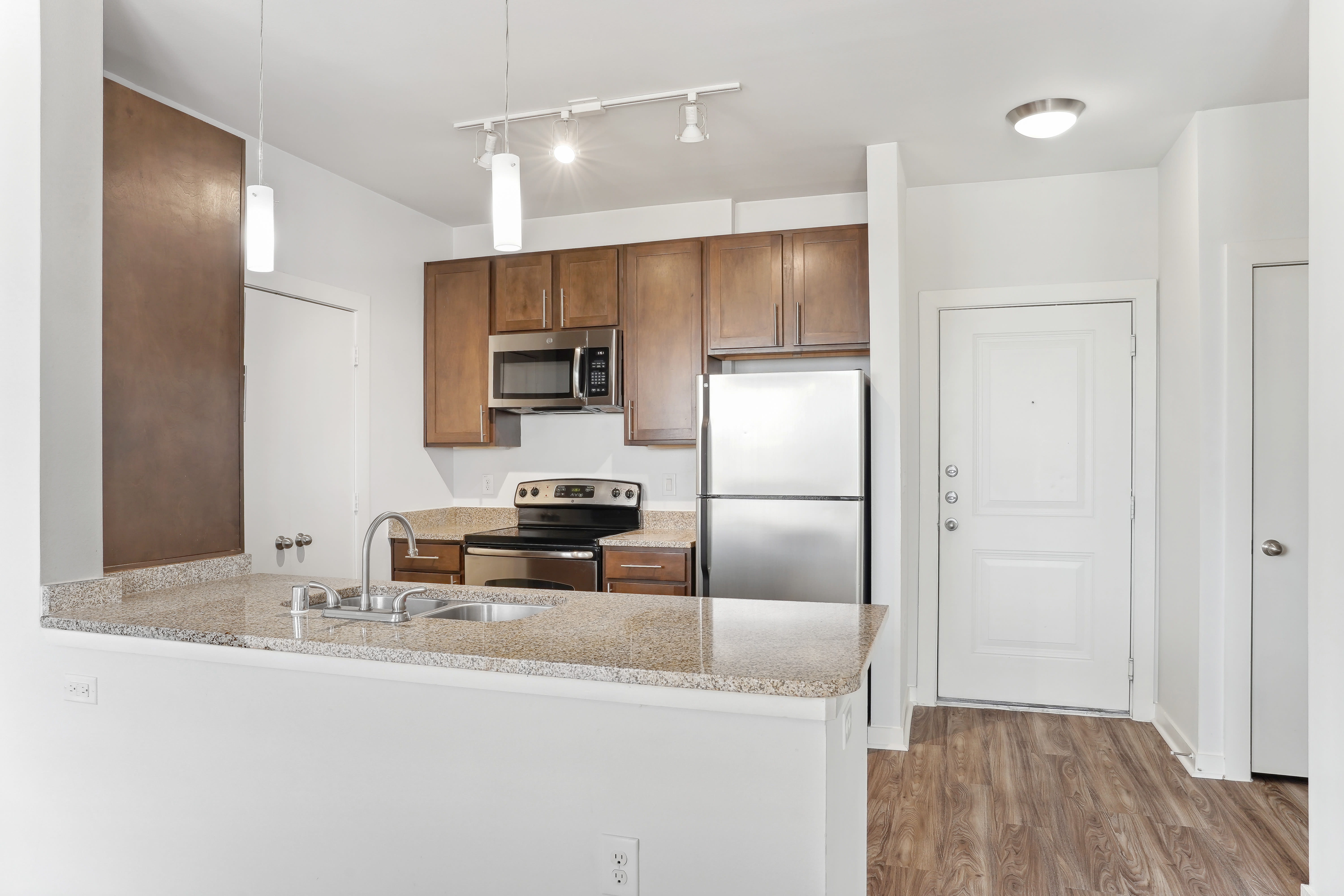 white kitchen at Flatiron District at Austin Ranch in The Colony, Texas