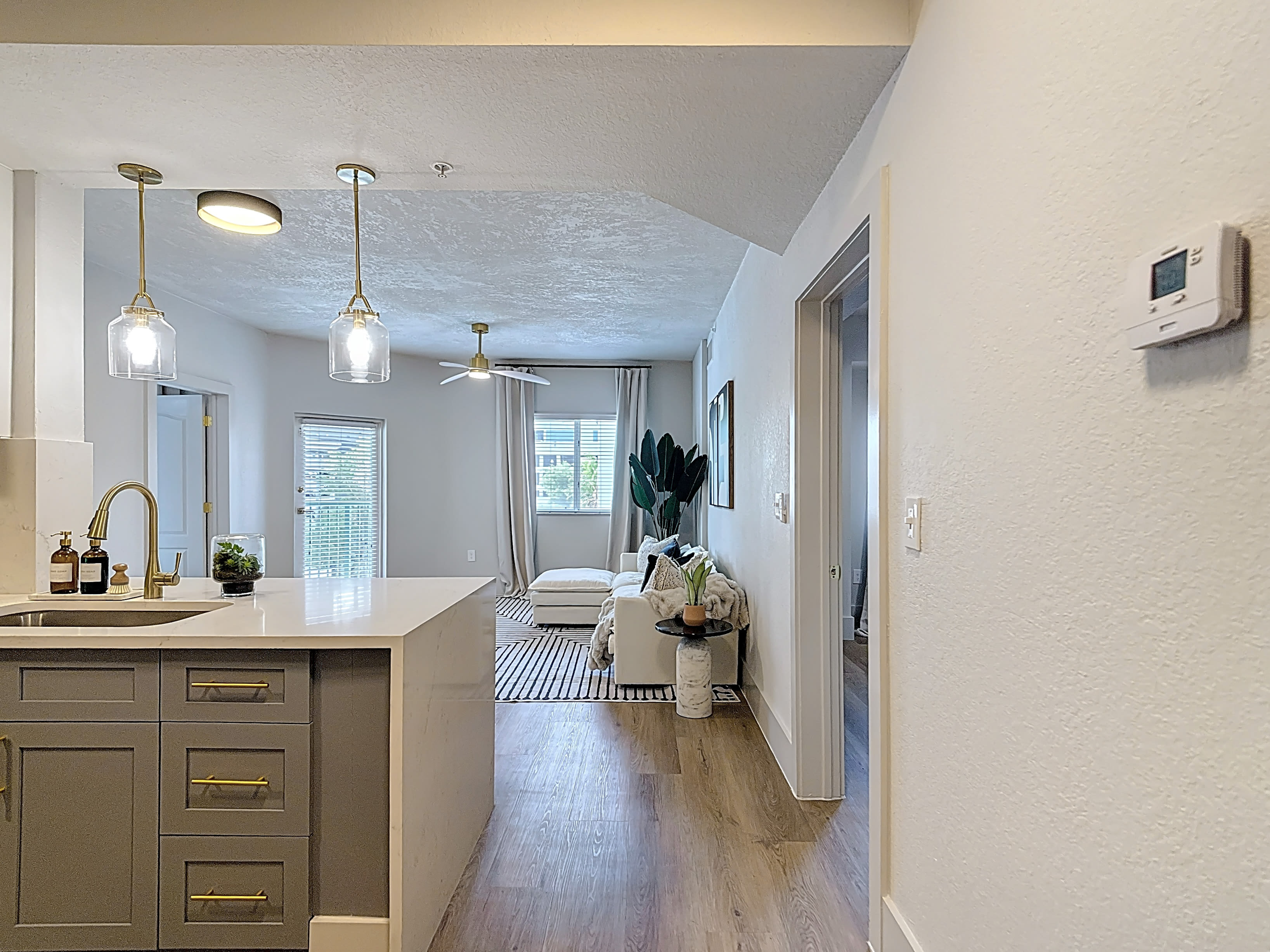 Modern kitchen with a sink and countertop at Valencia South Miami in South Miami, Florida