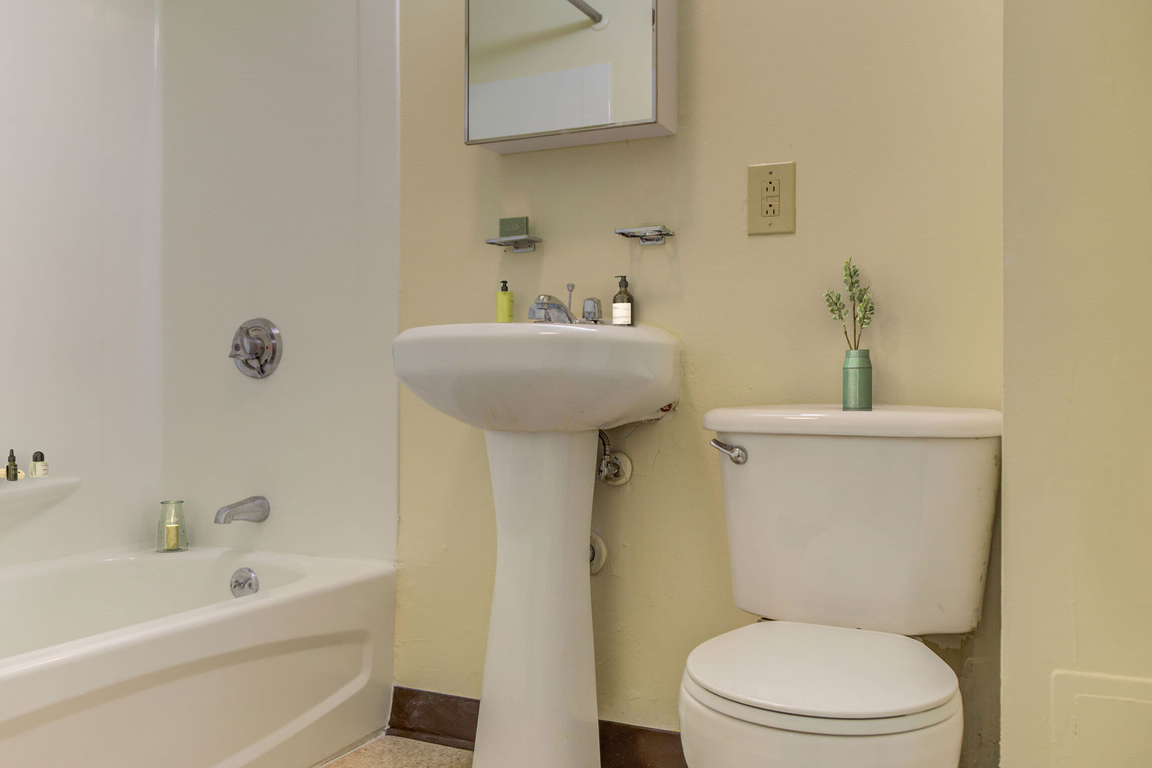 Washroom with attached bathtub at Blue Elm United Estates in Dorchester, Massachusetts