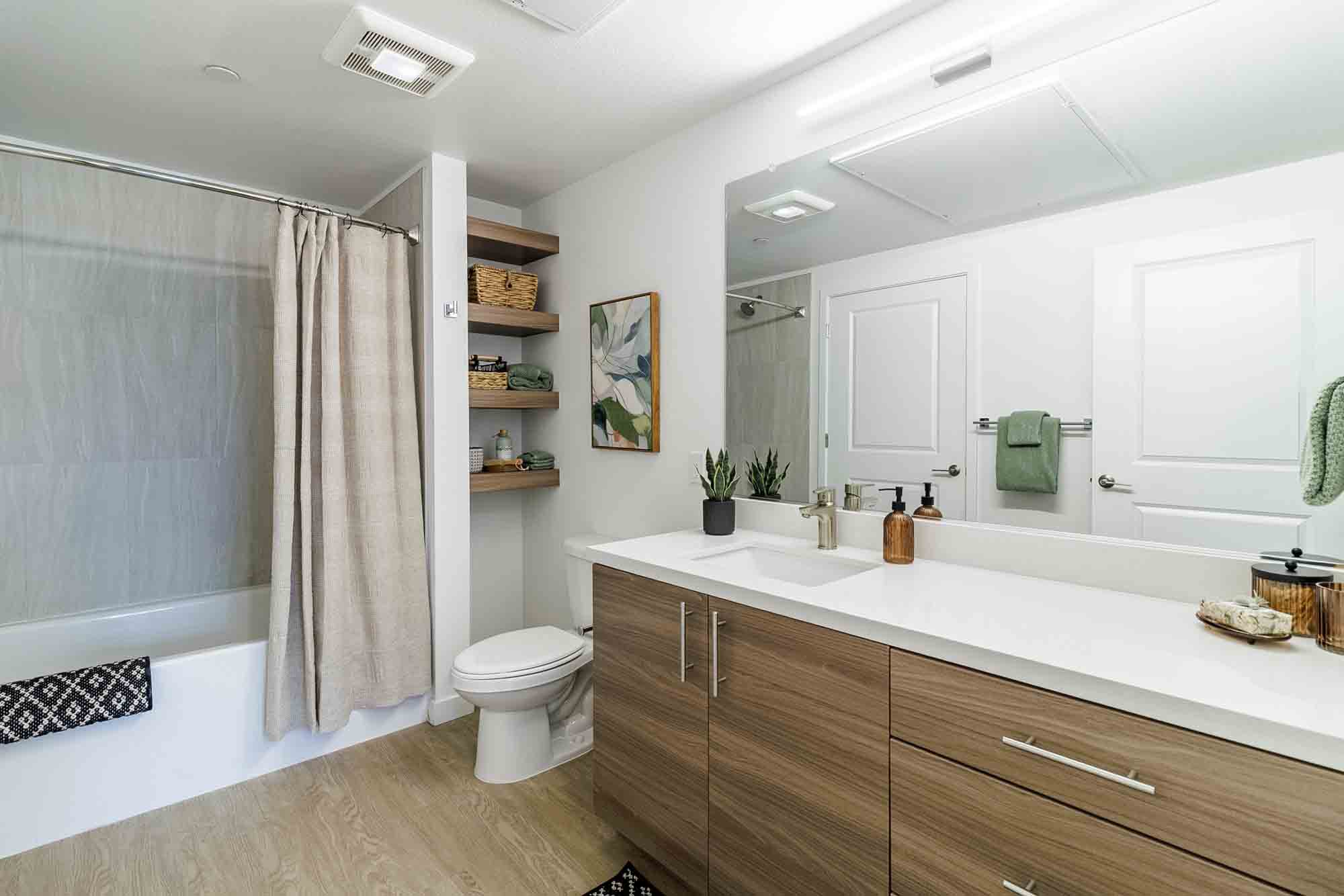 Kitchen with appliance at Sutter Green Apartments in Sacramento, California