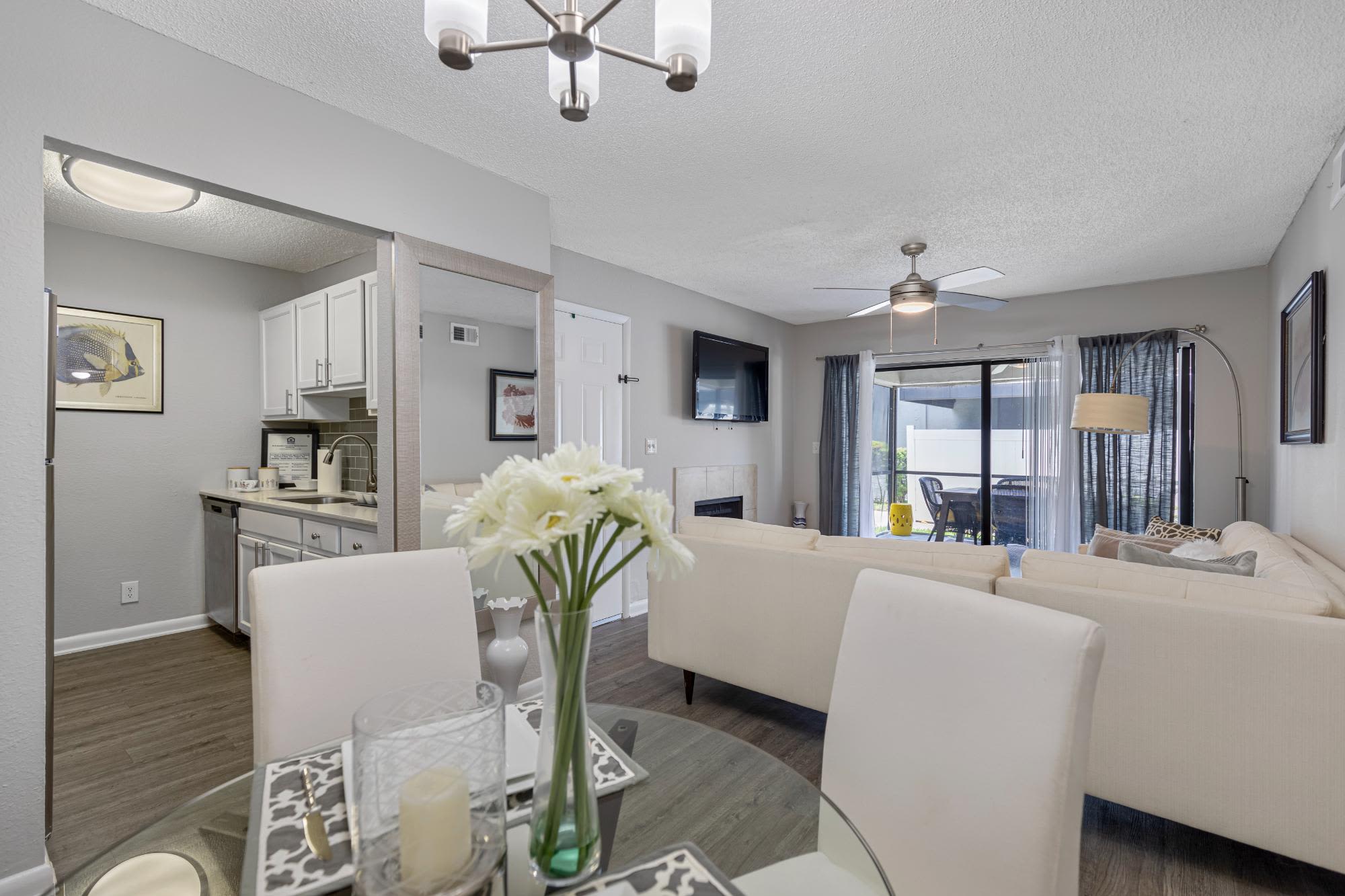 Dining room and view of living room at Stella Boca Raton Apartments, Boca Raton, Florida