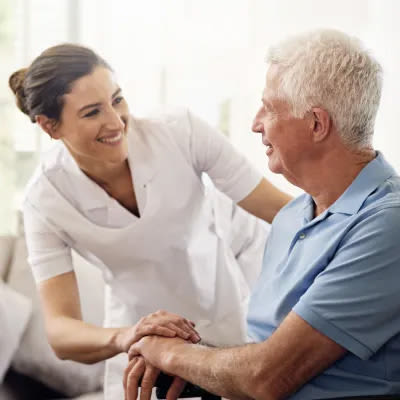 A nurse checking on a resident