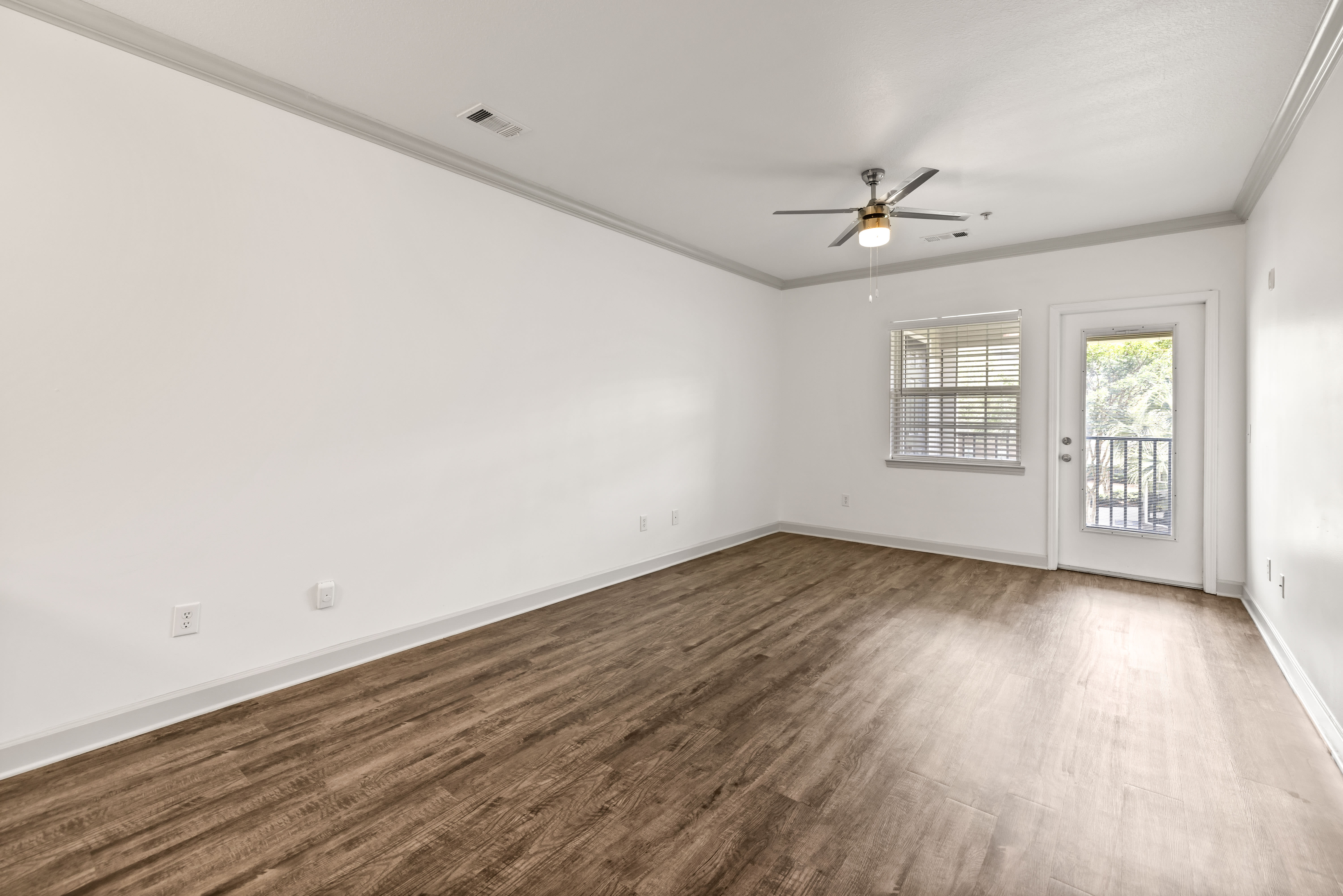 Hardwood flooring and modern living area of home at Olympus Carrington in Pooler, Georgia