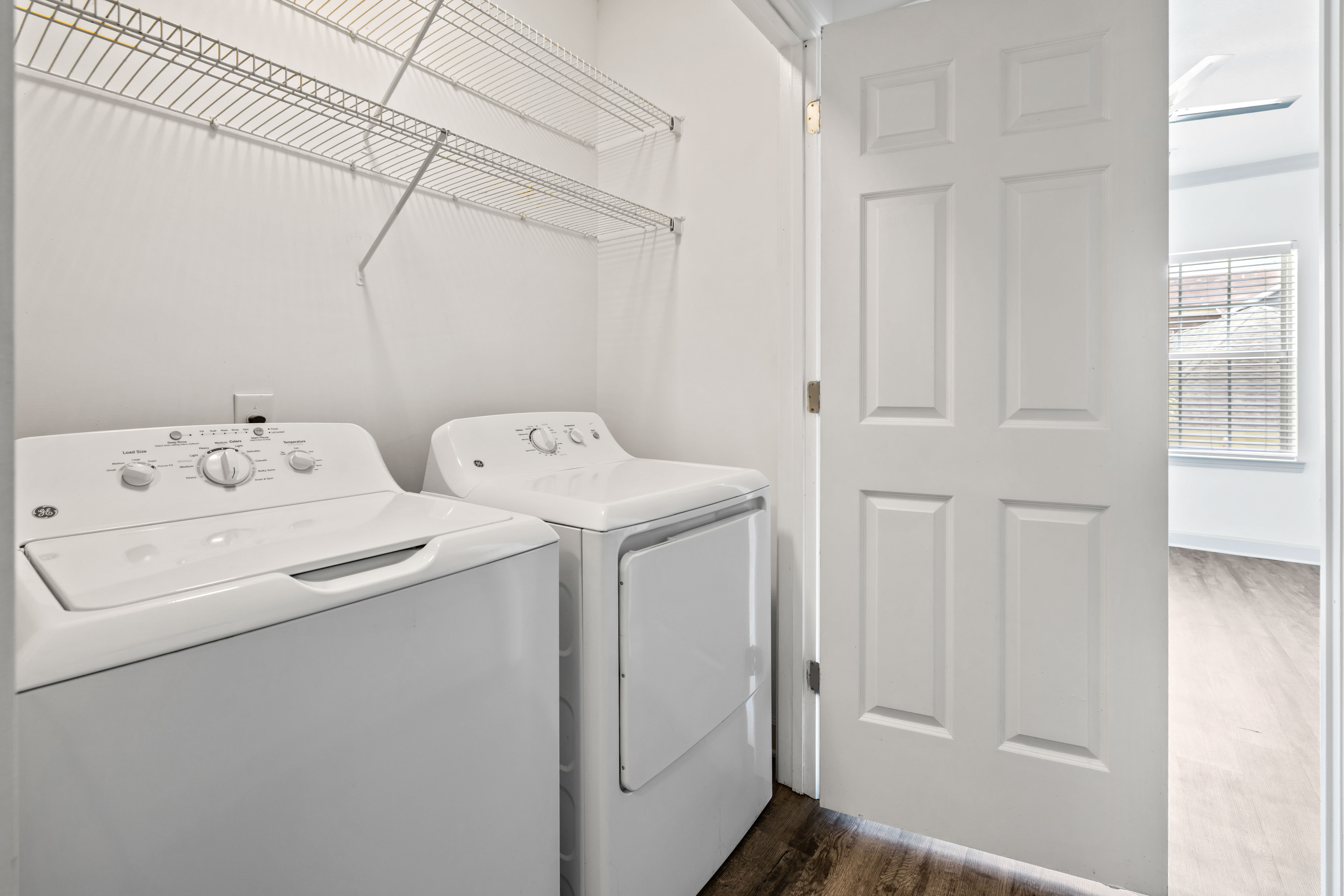 Laundry room at Olympus Carrington in Pooler, Georgia