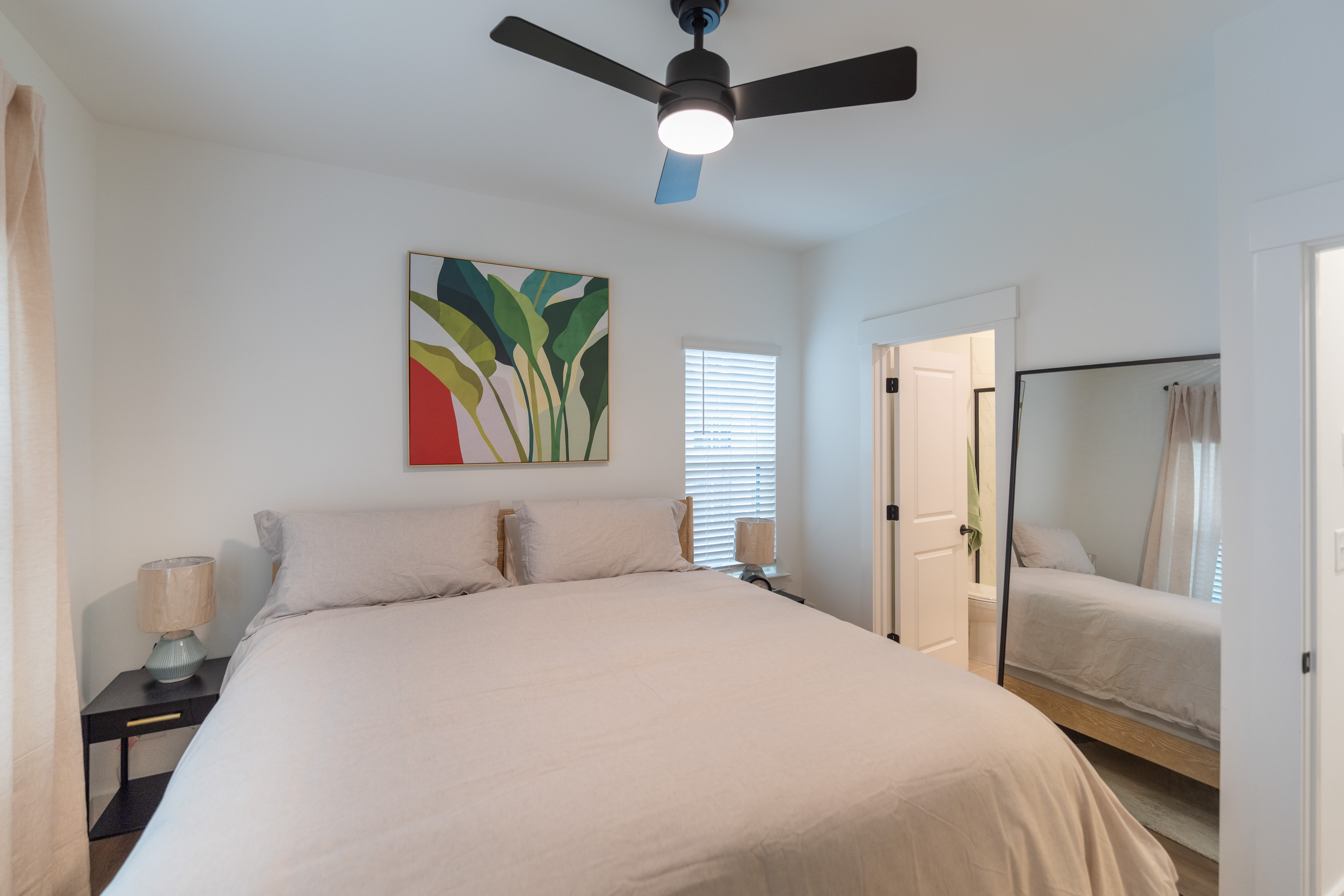 Spacious bedroom with proper lighting at One West End in Charlotte, North Carolina
