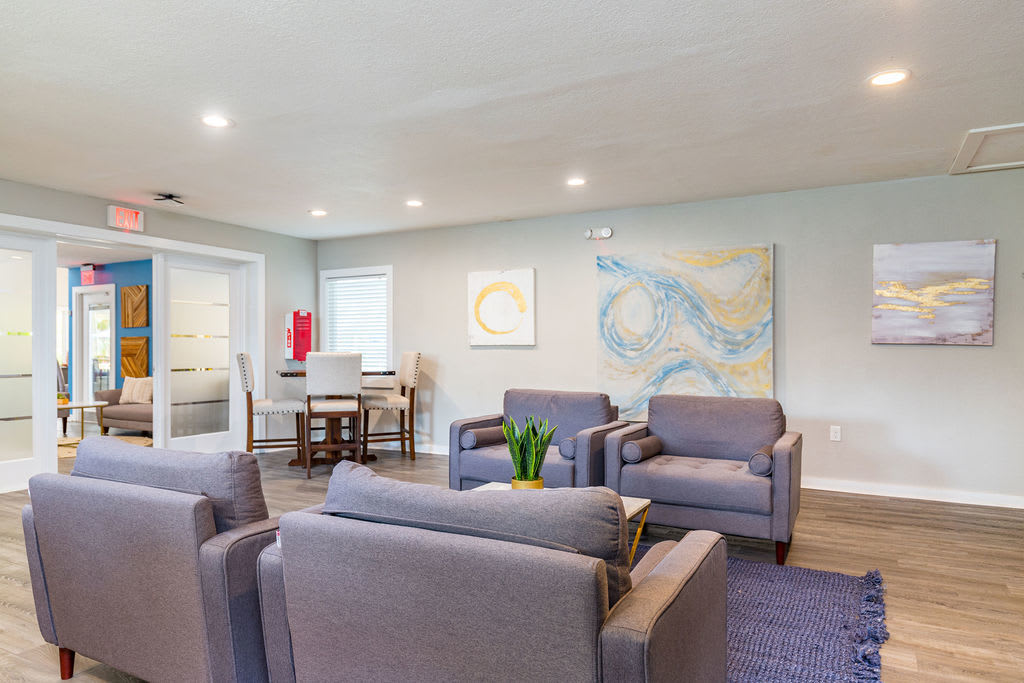 Clubhouse with multiple seating at Trellis at the Lakes in St. Petersburg, Florida