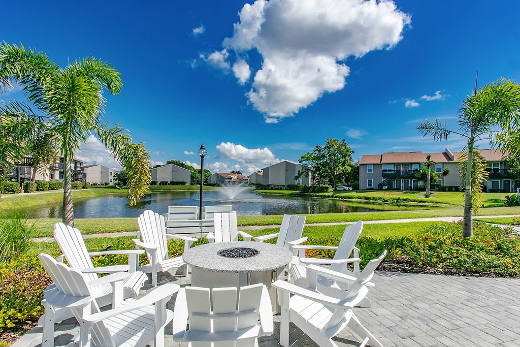 Outdoor seating with fire pit at Trellis at the Lakes in St. Petersburg, Florida