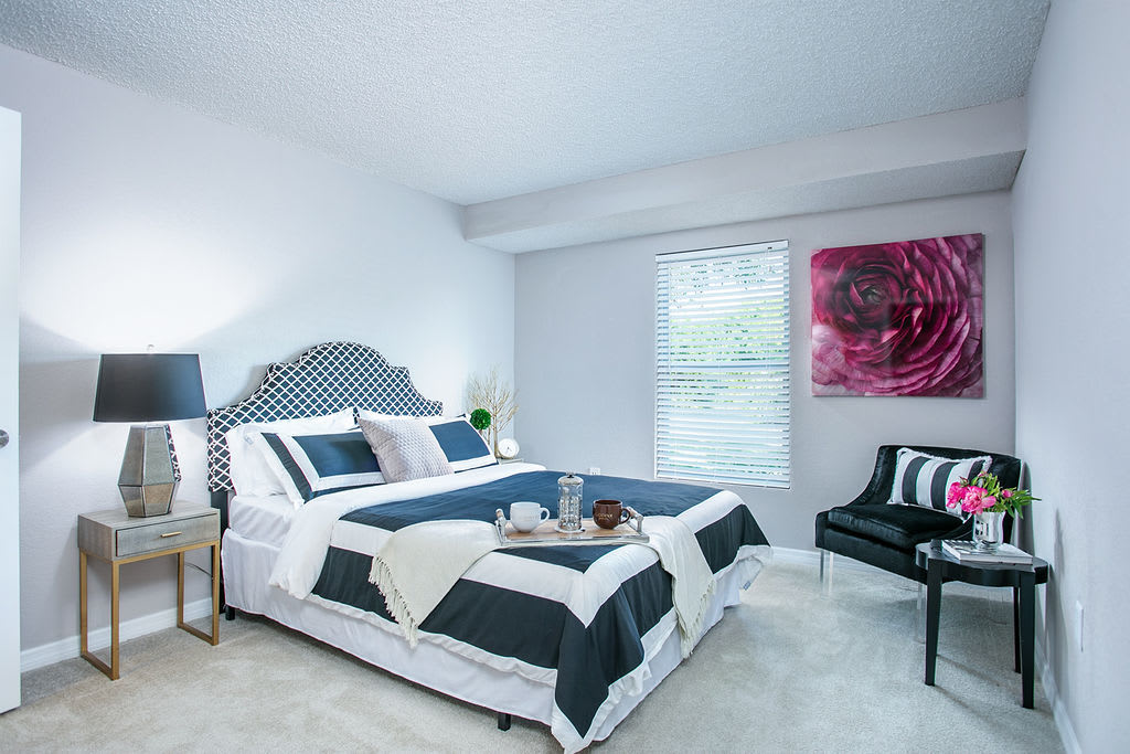 Bedroom with windows at Trellis at the Lakes in St. Petersburg, Florida