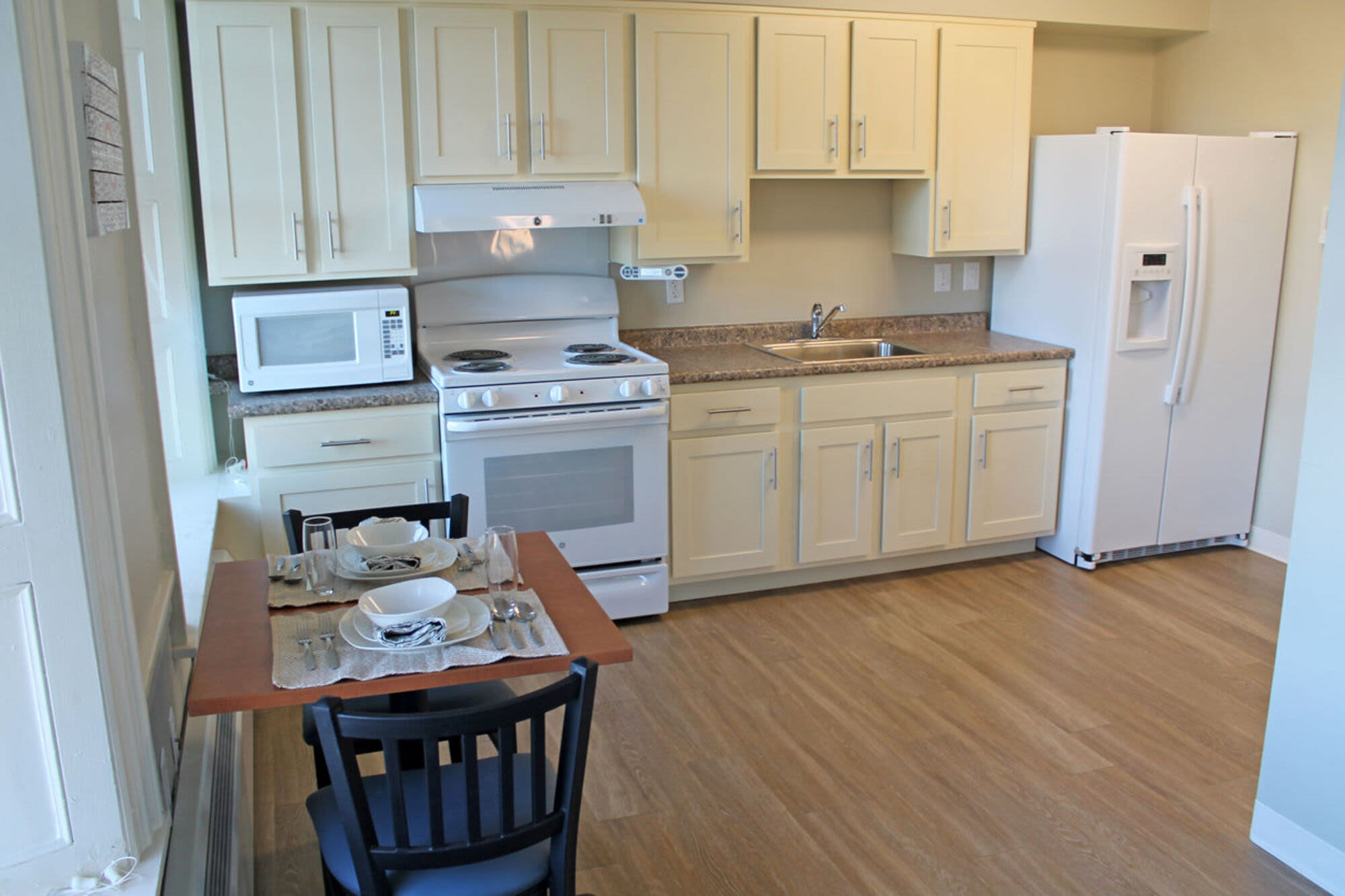 Kitchen with dining area at Howard House in Brockton, Massachusetts