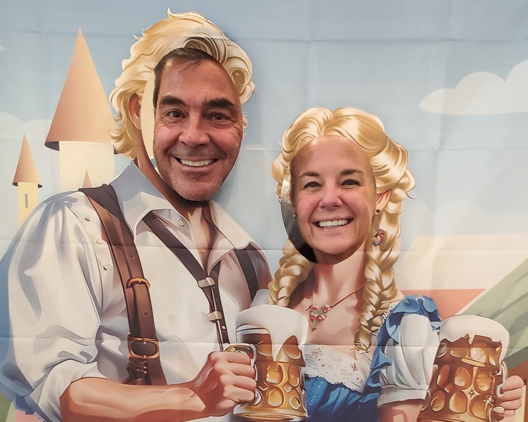 Resident couple having fun with cutouts at The Barclay at Santa Rosa Beach in Santa Rosa Beach,Florida