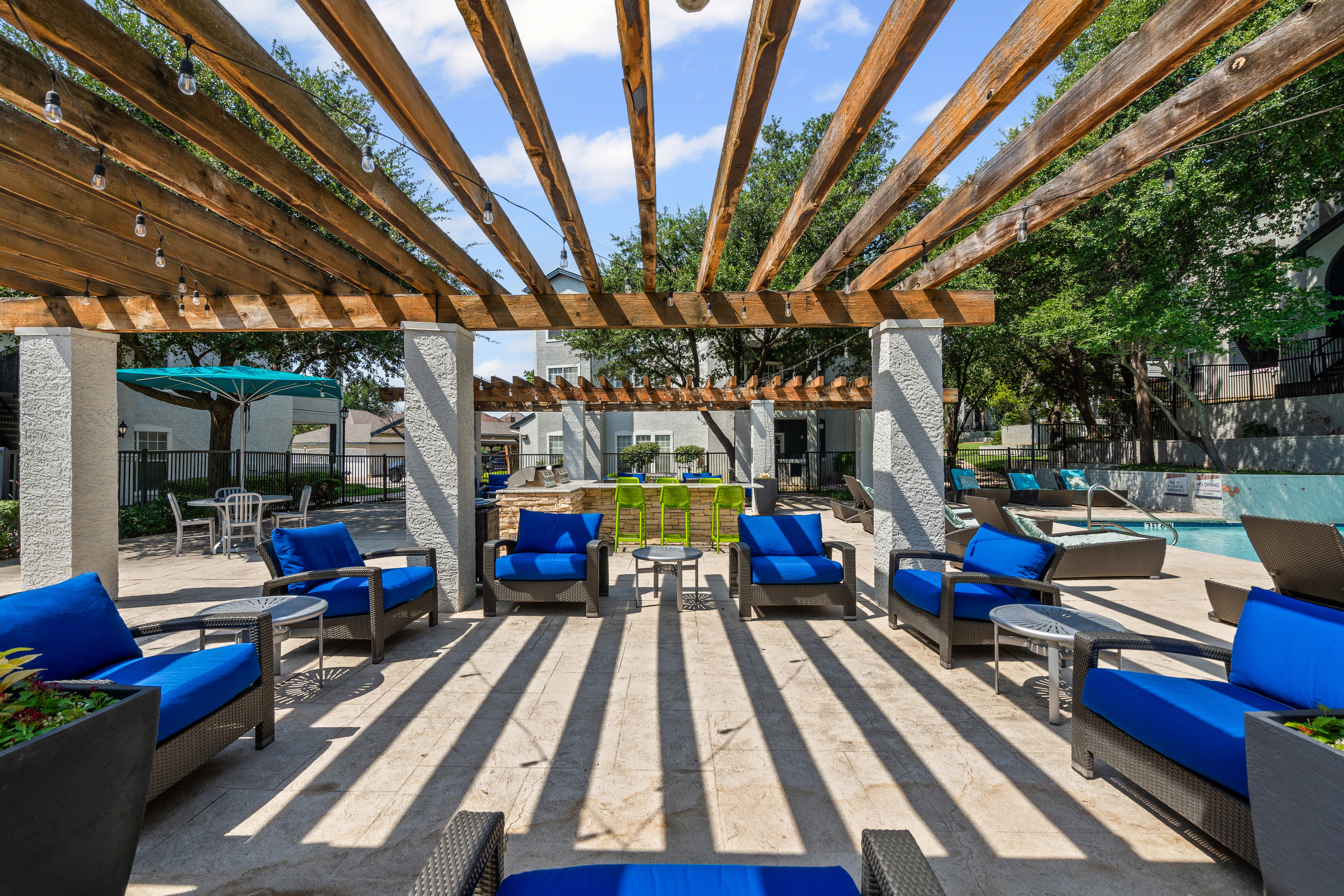 Poolside seating at  Rancho Mirage in Irving, Texas