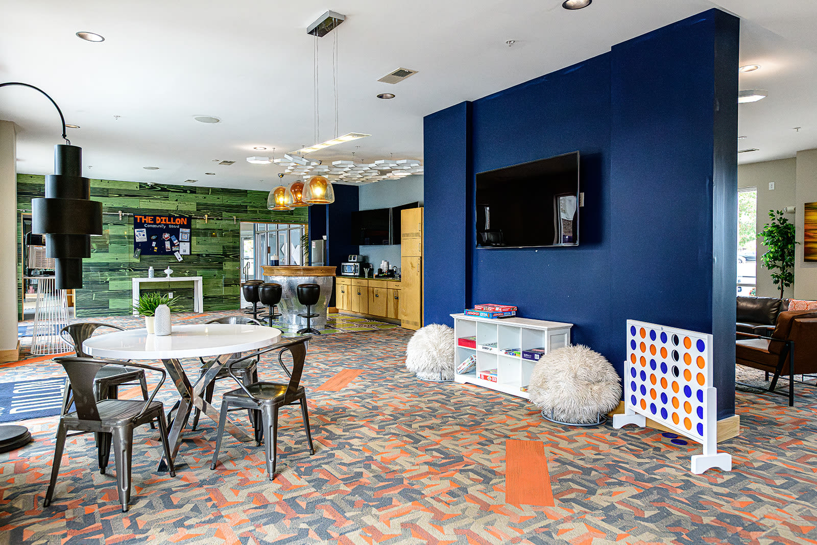 Tables in the clubhouse at The Dillon in Bloomington, Indiana