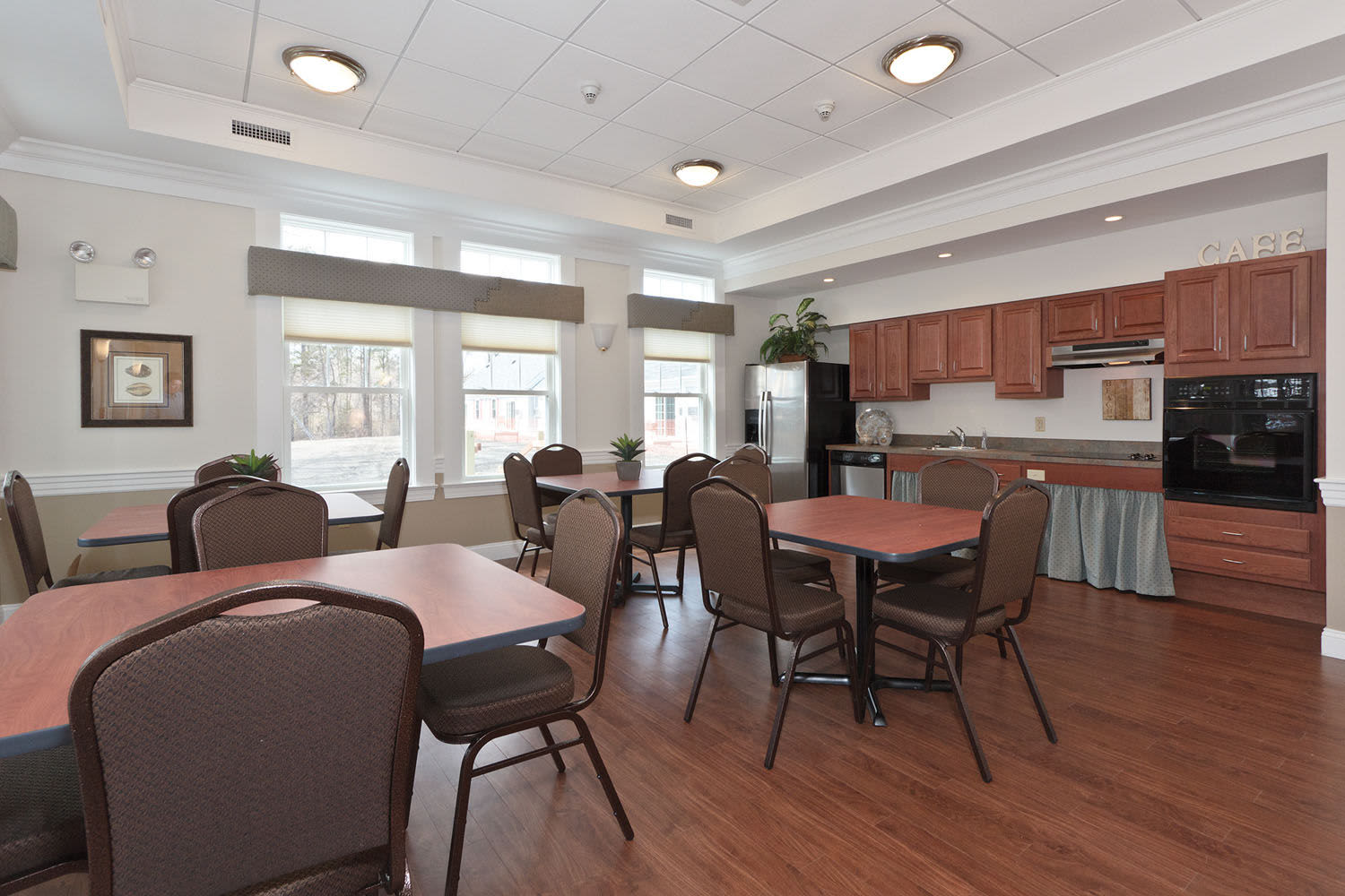Community dinning and kitchen area at Little Neck Village in Marion, Massachusetts