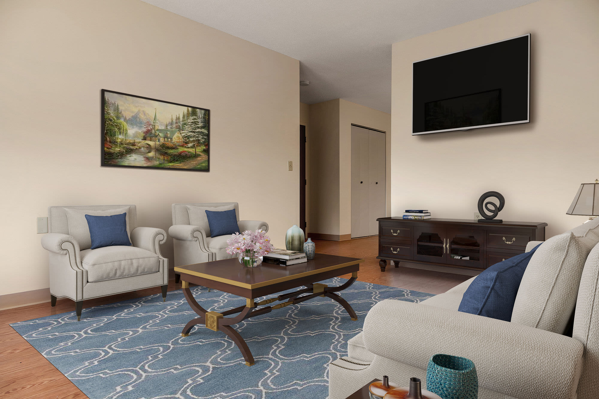 Living room with tv at Mazur Park Apartments in Lowell. MA