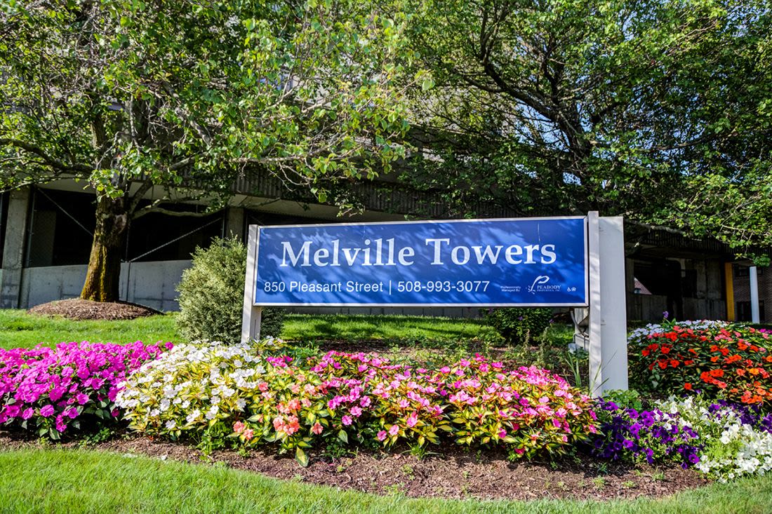 Property signage board at Melville Towers in New Bedford, Massachusetts