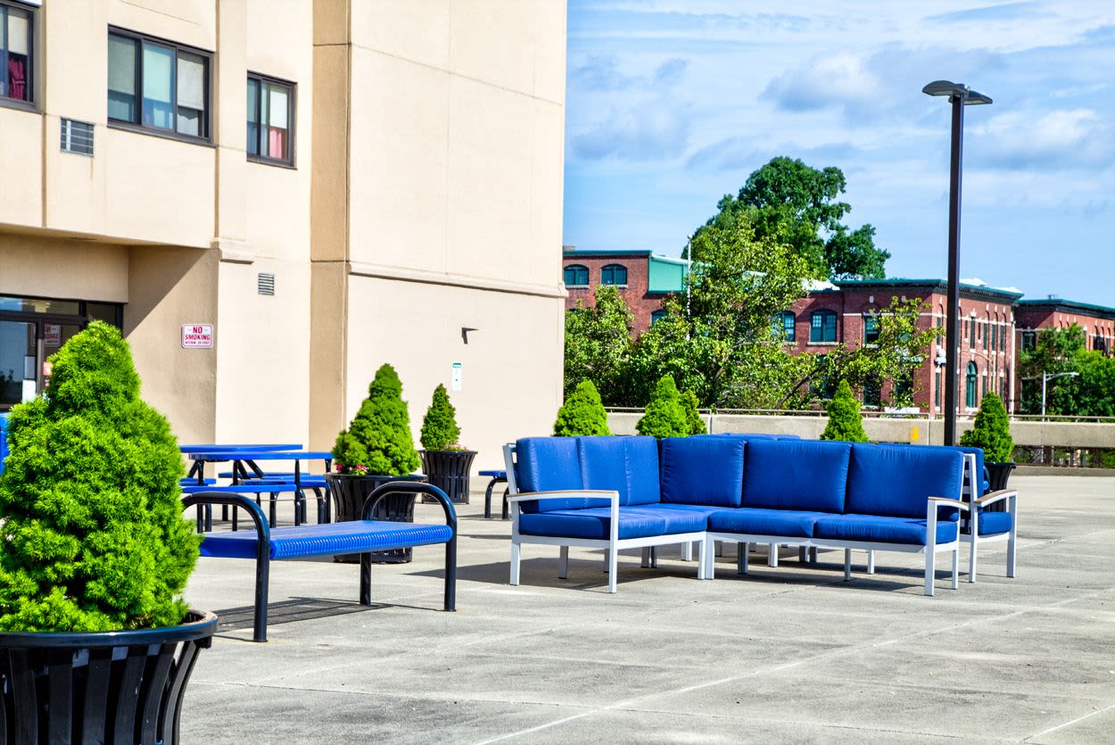 Outdoor lounge area at Melville Towers in New Bedford, Massachusetts