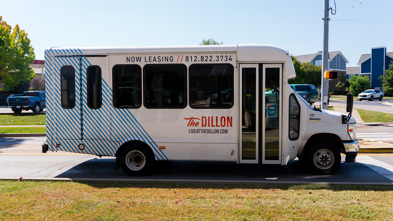 Friends standing outside their car near The Dillon in Bloomington, Indiana