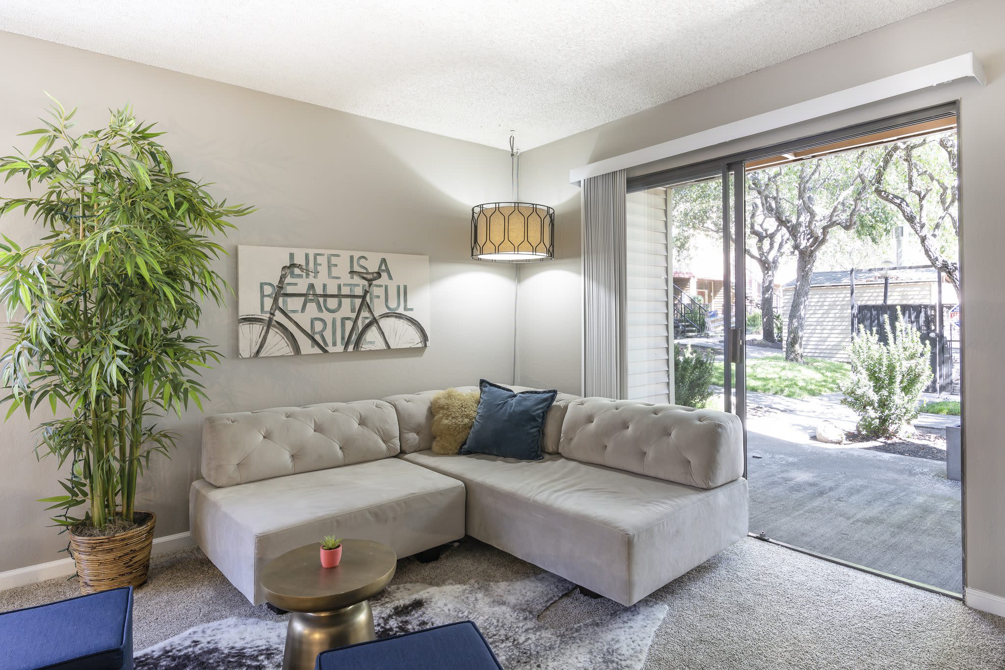 View of the living room at Woodchase Apartments in San Leandro, California