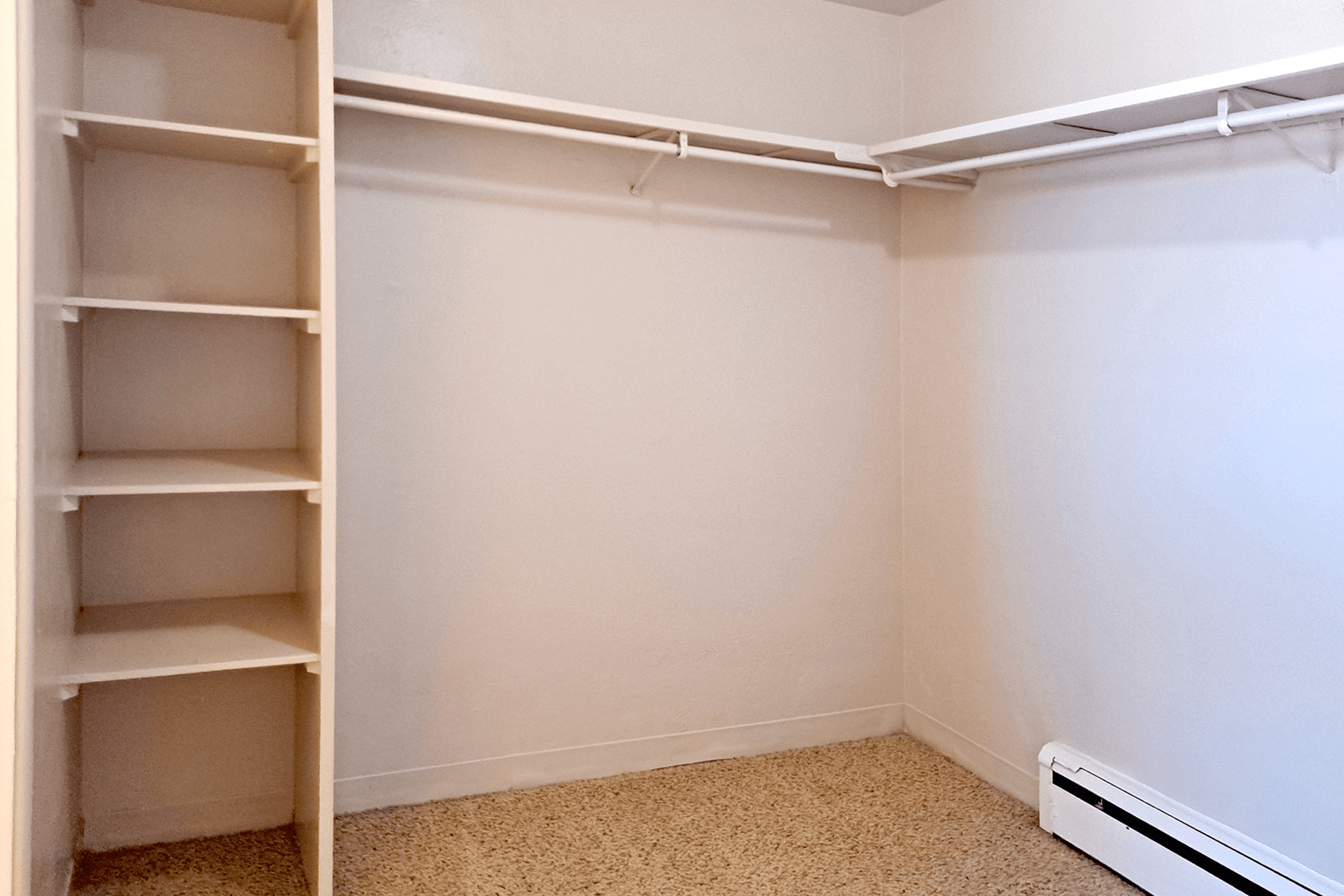 Closet with shelving at Boulder Crescent in Colorado Springs, Colorado