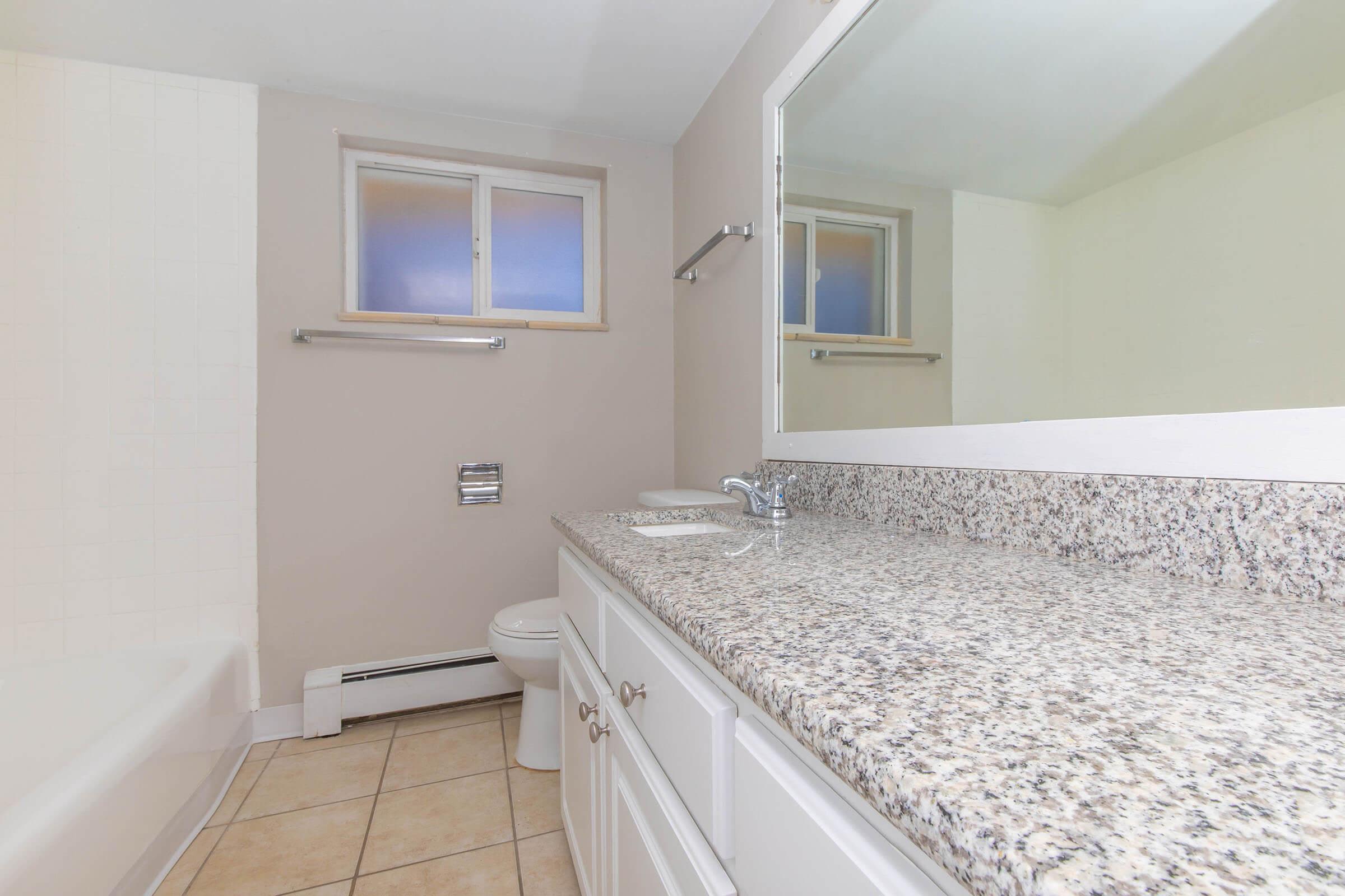Bathroom with large vanity at Boulder Crescent in Colorado Springs, Colorado